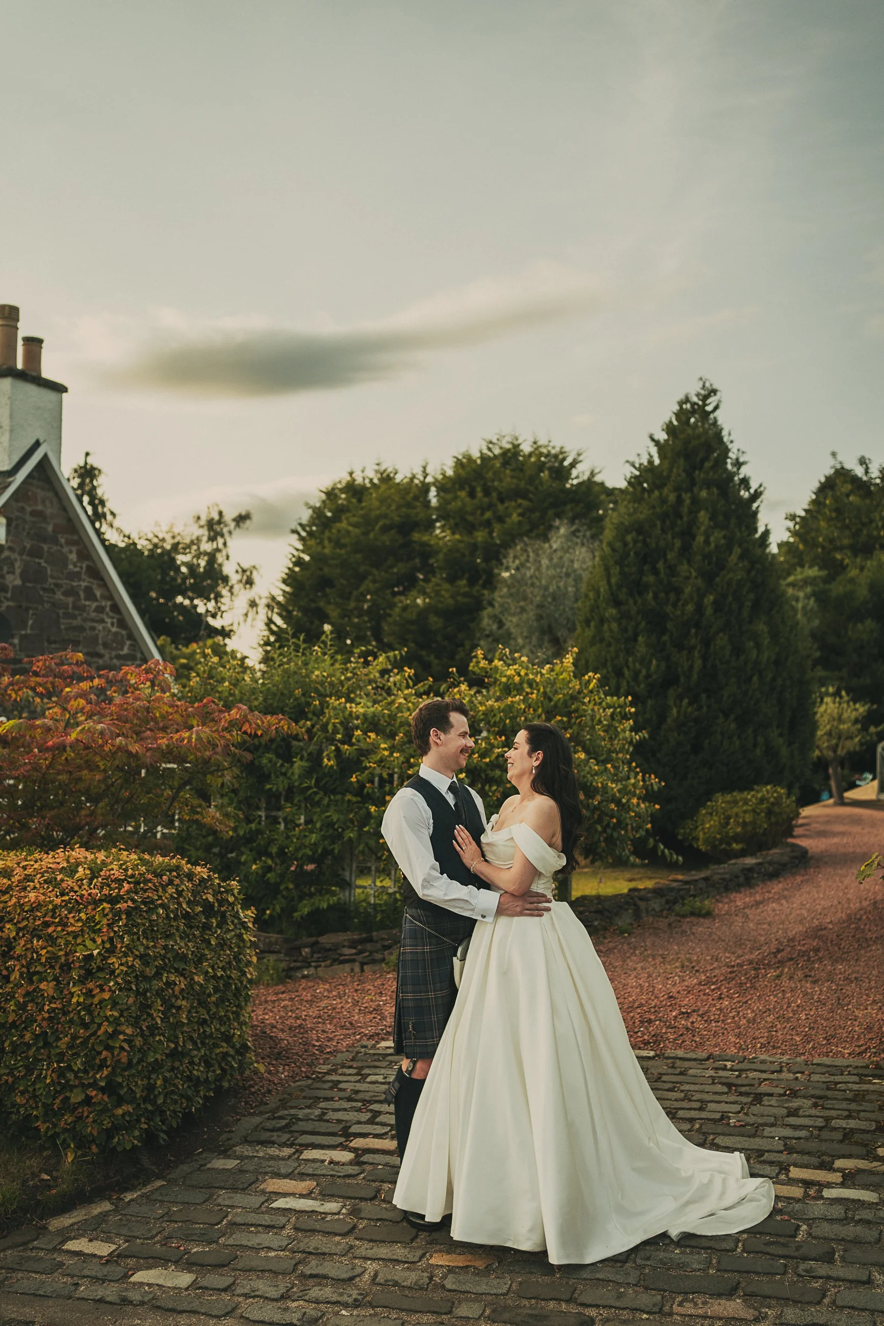 claire-adam-embrace-cobbled-street-killearn.jpg