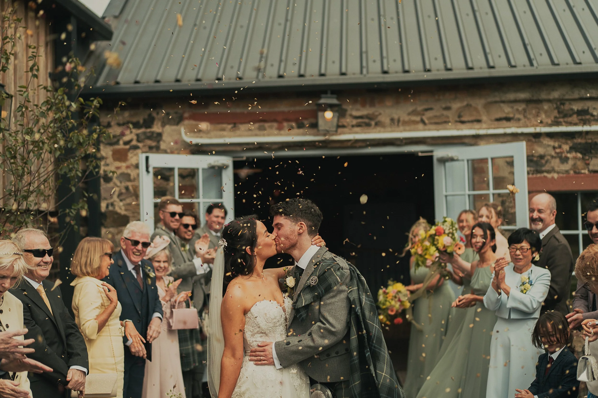 josie-david-confetti-kiss-rossie-on-the-earn-wedding.jpg