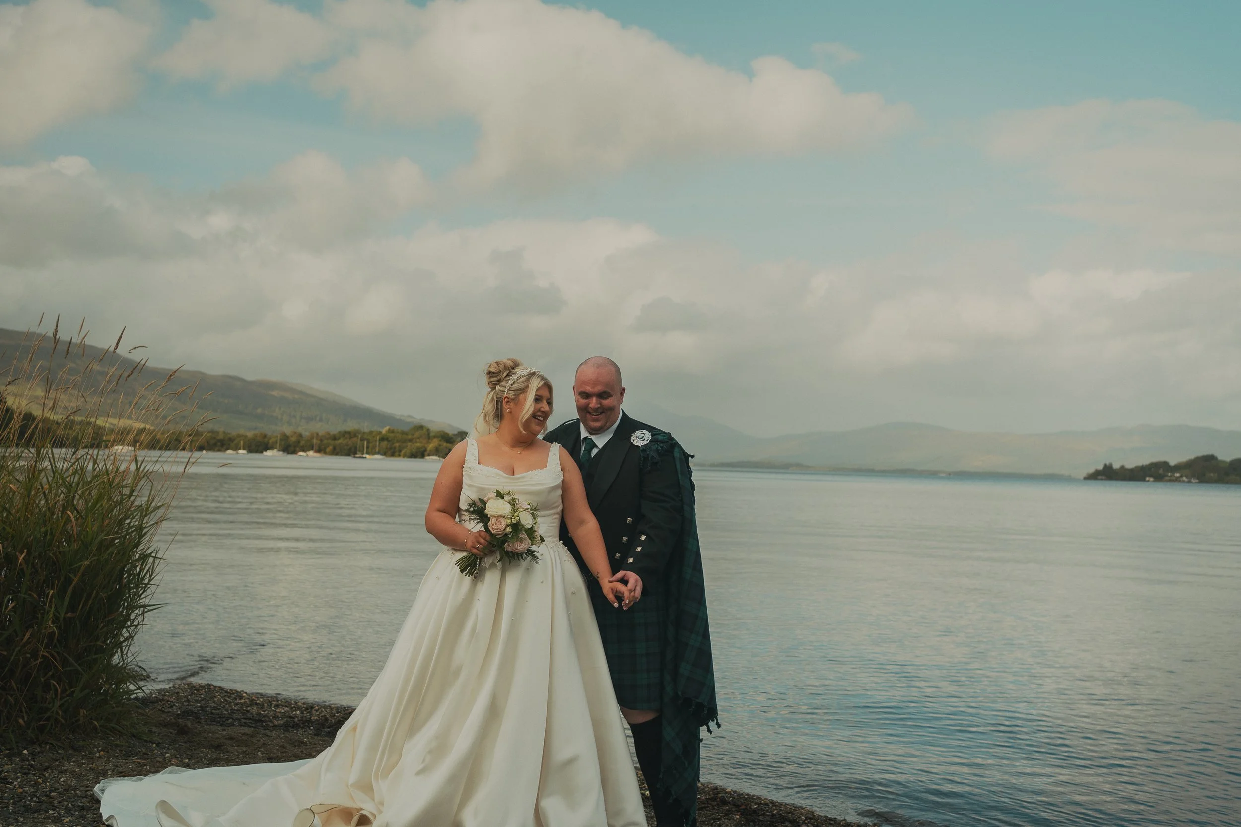 laura-nicky-the-cruin-loch-lomond-wedding-couple-loch-shore.jpg