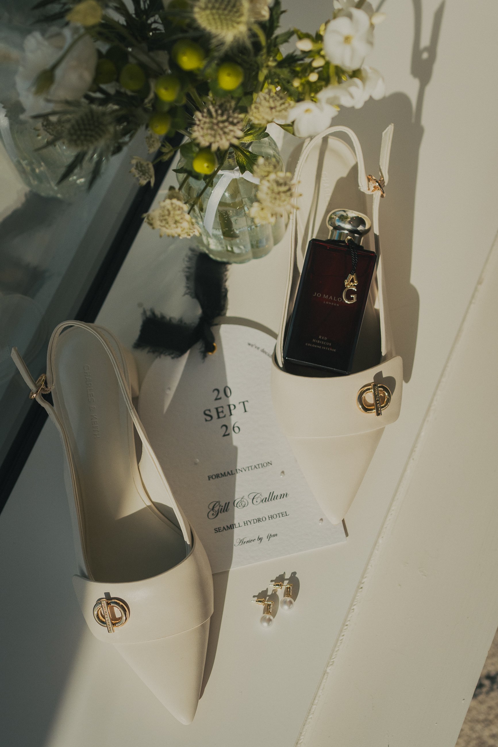 gill-callum-seamill-hydro-wedding-details-invitation-shoes-flowers.jpg