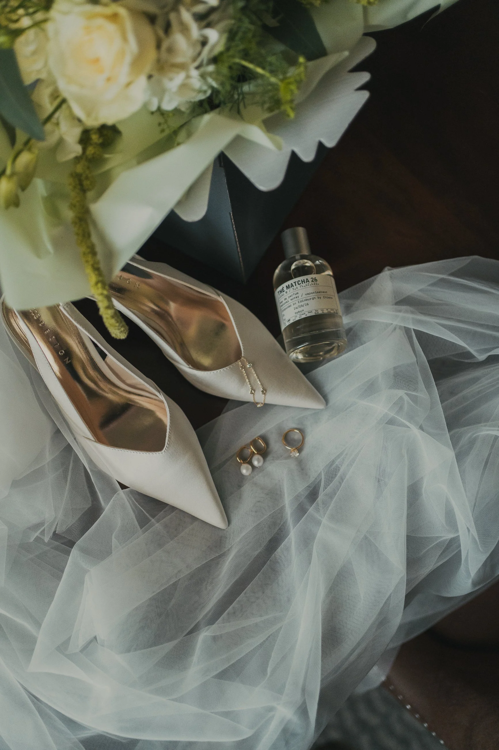 robyn-falside-mill-wedding-details-flowers-shoes-ring.jpg