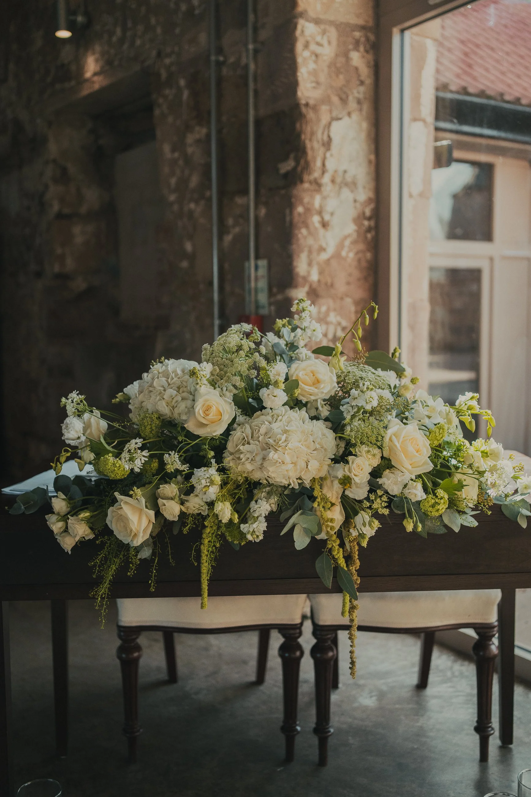 falside-mill-wedding-signing-table-flower-centrepiece.jpg