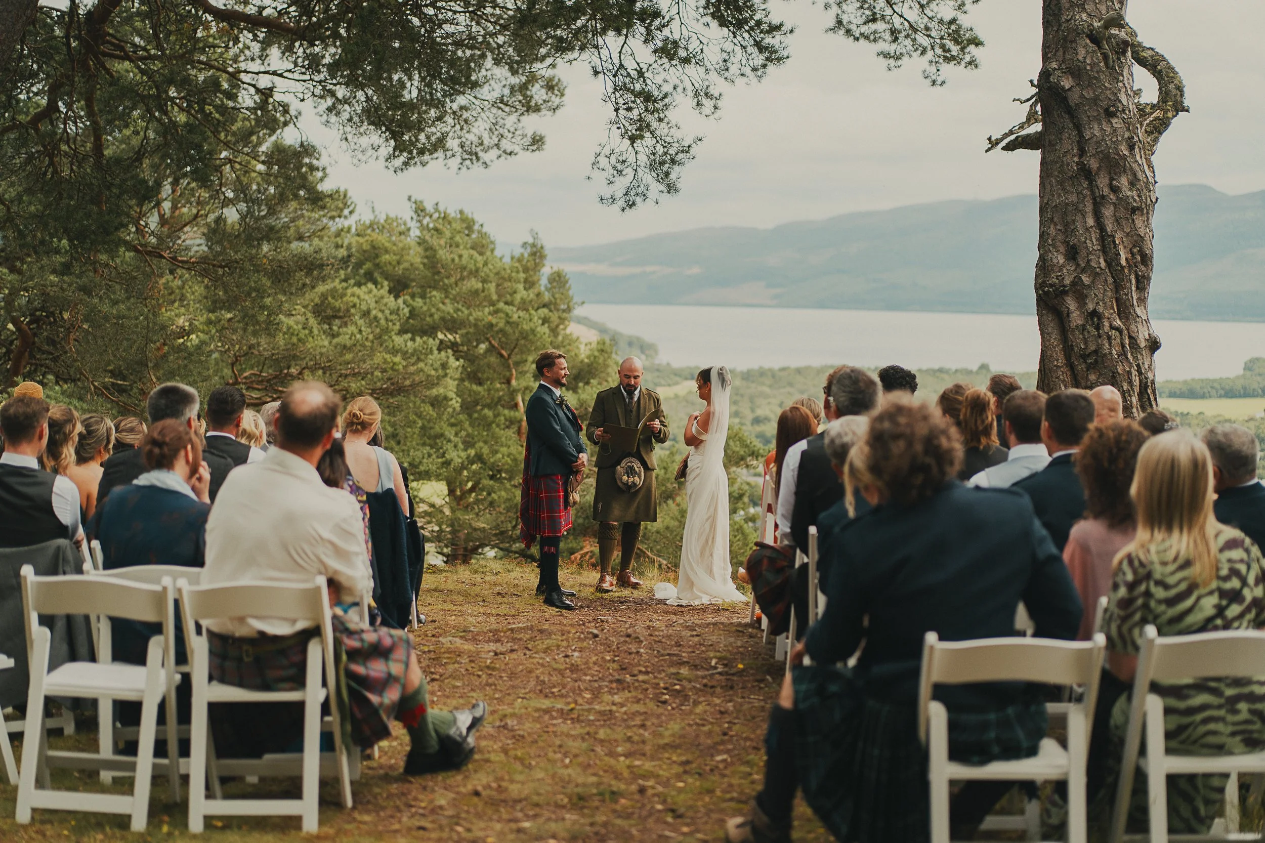 Becca and Joe during their Craigmonie Hill wedding ceremony near Drumnadrochit