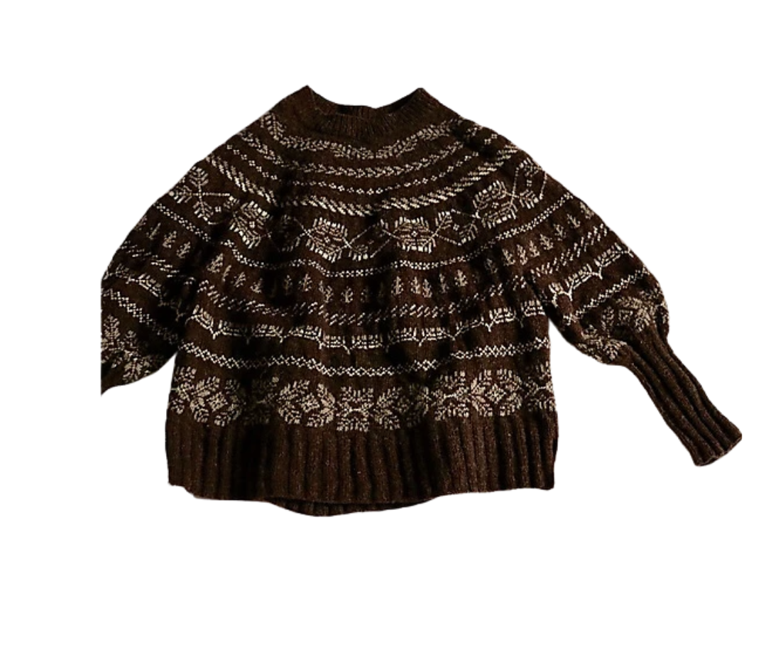 Brown knitted sweater with white winter-themed patterns including snowflakes and trees.
