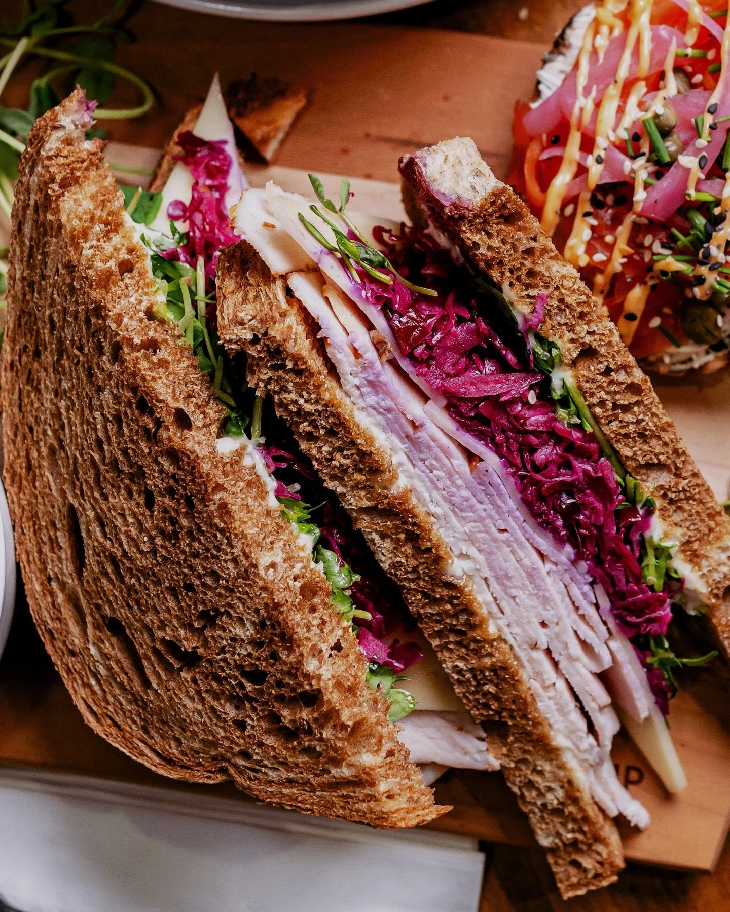 Cold outside, stacked inside 🤤 🥪

Oven-roasted turkey breast on hearty rye, some cozy Swiss, fresh pea sprouts, and a crisp apple cabbage slaw 🥪🍎🥬

The crunch. The craving. The comfort.

If you needed a sign to swing by, this is it! 😉❤️