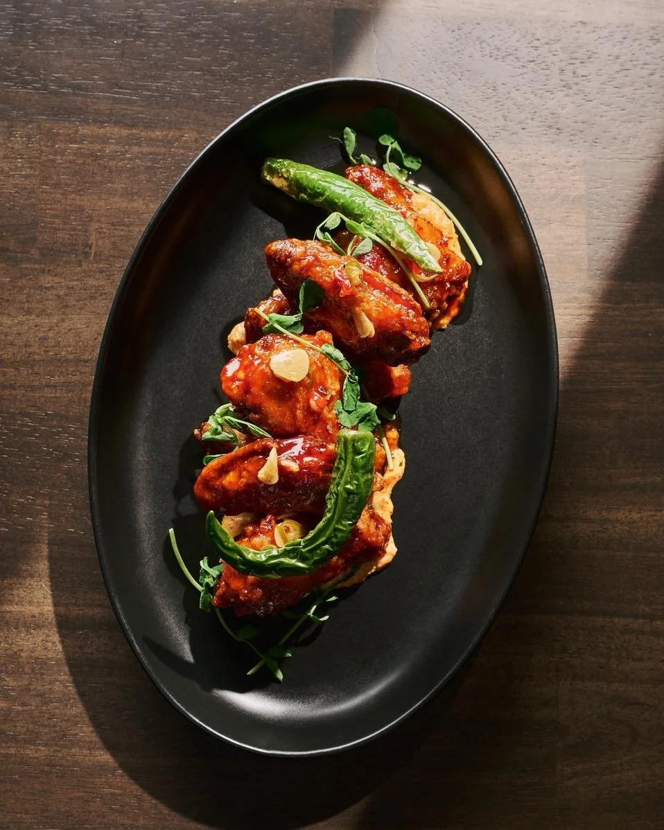 Sticky, spicy, a little sweet &mdash; all things Wing night should be 🤤🔥 🙌🏼

Gochujang heat, maple glaze, and that punchy kimchi finish. . every bite hits different.

Come through and let&rsquo;s get messy 👀

#datenightyyz #yyzeats #BukaAfterDar