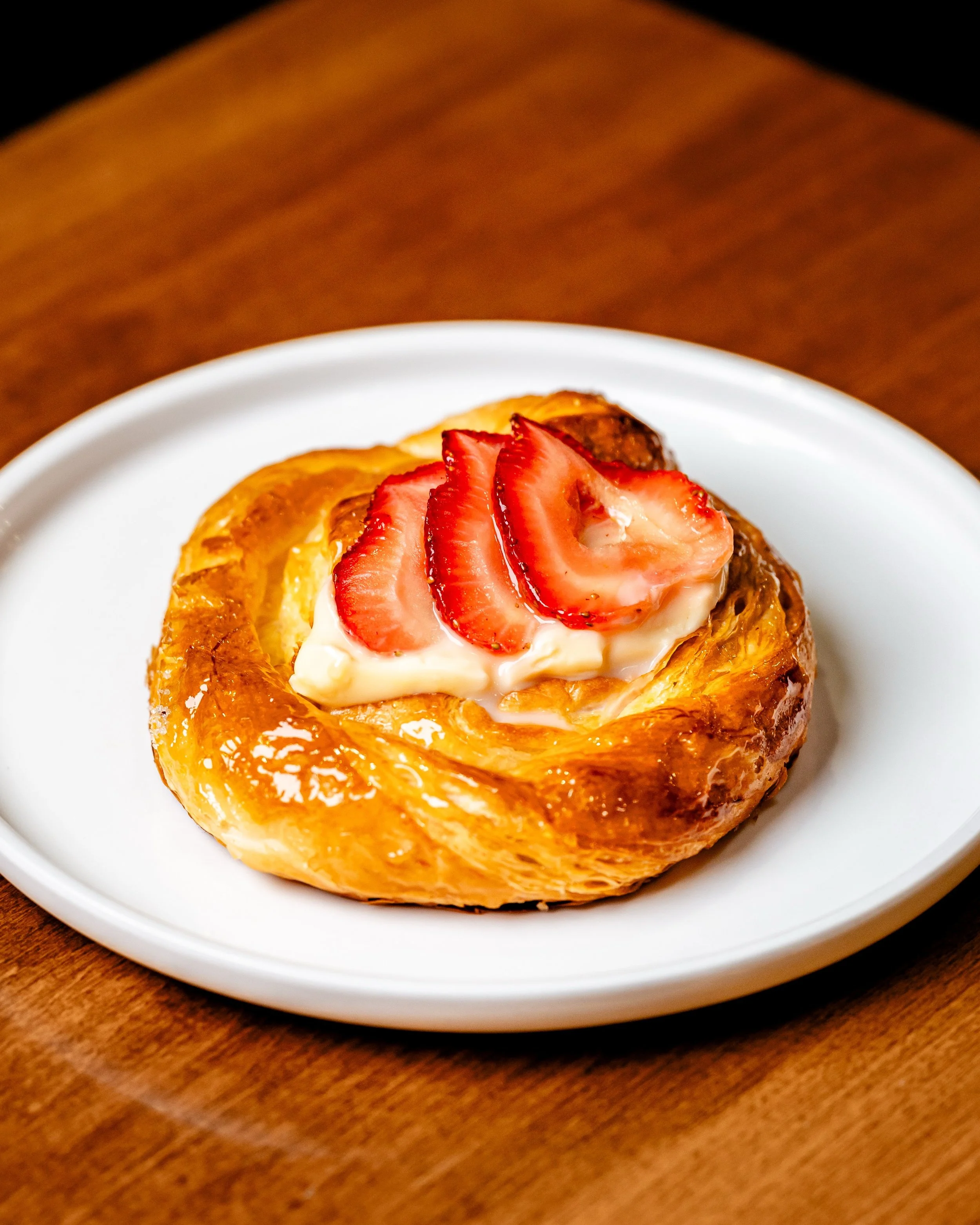 Flaky layers, silky custard, and pastry perfection ✨🥐🍓

One bite of this and you&rsquo;ll know exactly why this one never lasts too long in our pastry case 🤤

We have some fresh out of the oven and ready for your next coffee break ☕️

Stop by and 