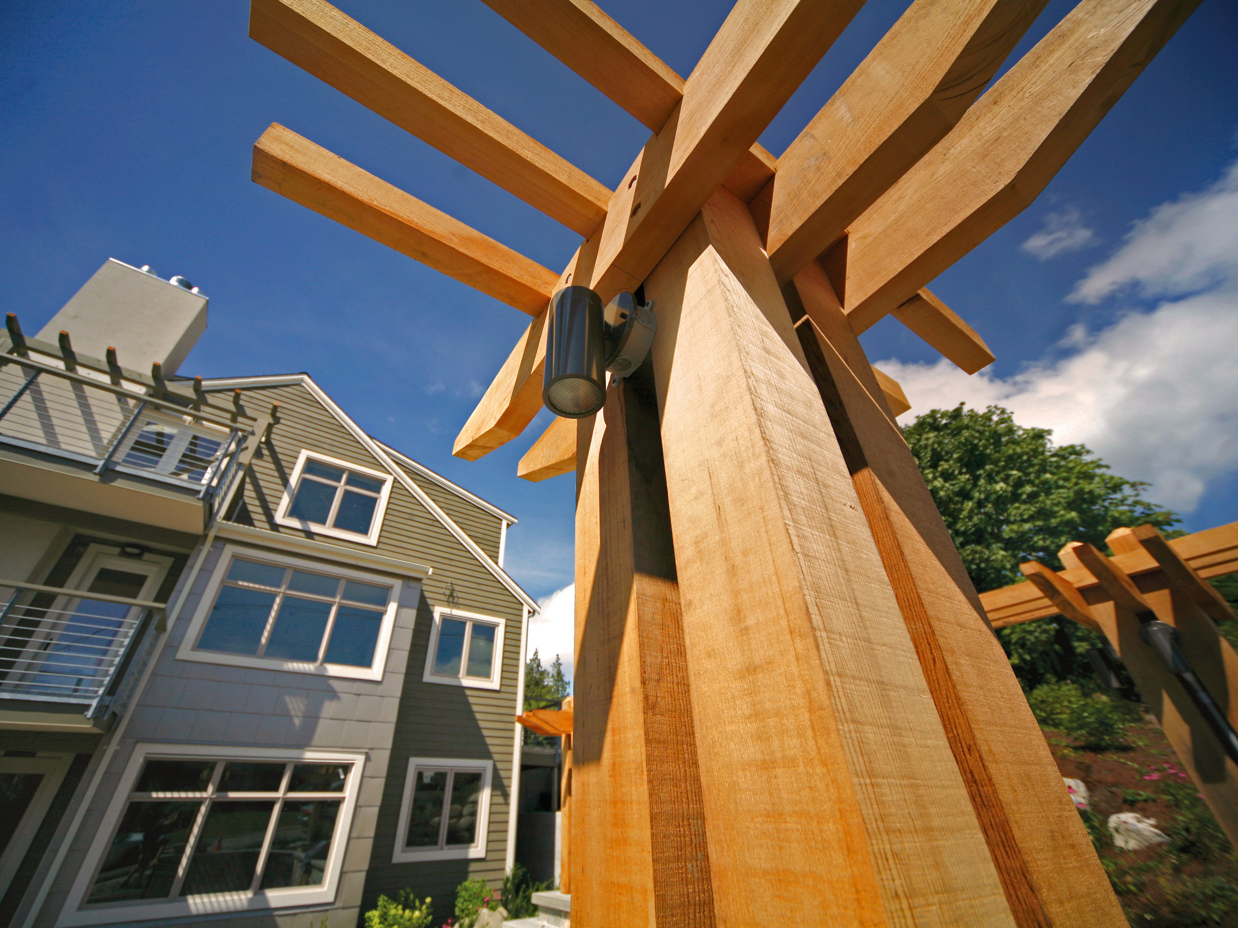 I often look for intriguing viewpoints of architectural features such as this trellis in the courtyard next to the condominiums. Many of my clients enjoy the look of perspective-bending shots like this, while others prefer their images straight and neat. I adapt accordingly when I’m out shooting, but always try to throw in a few surprises as well.