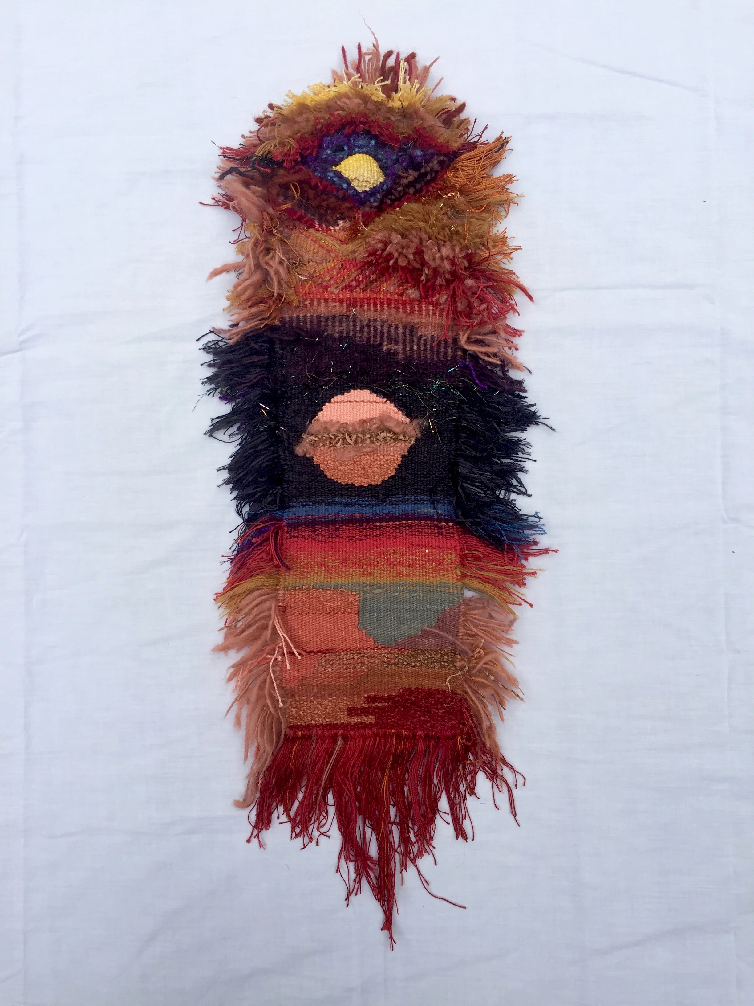 Landscape Tapestry, 2017. Various handspun and commercial yarns. 9” x 29”.