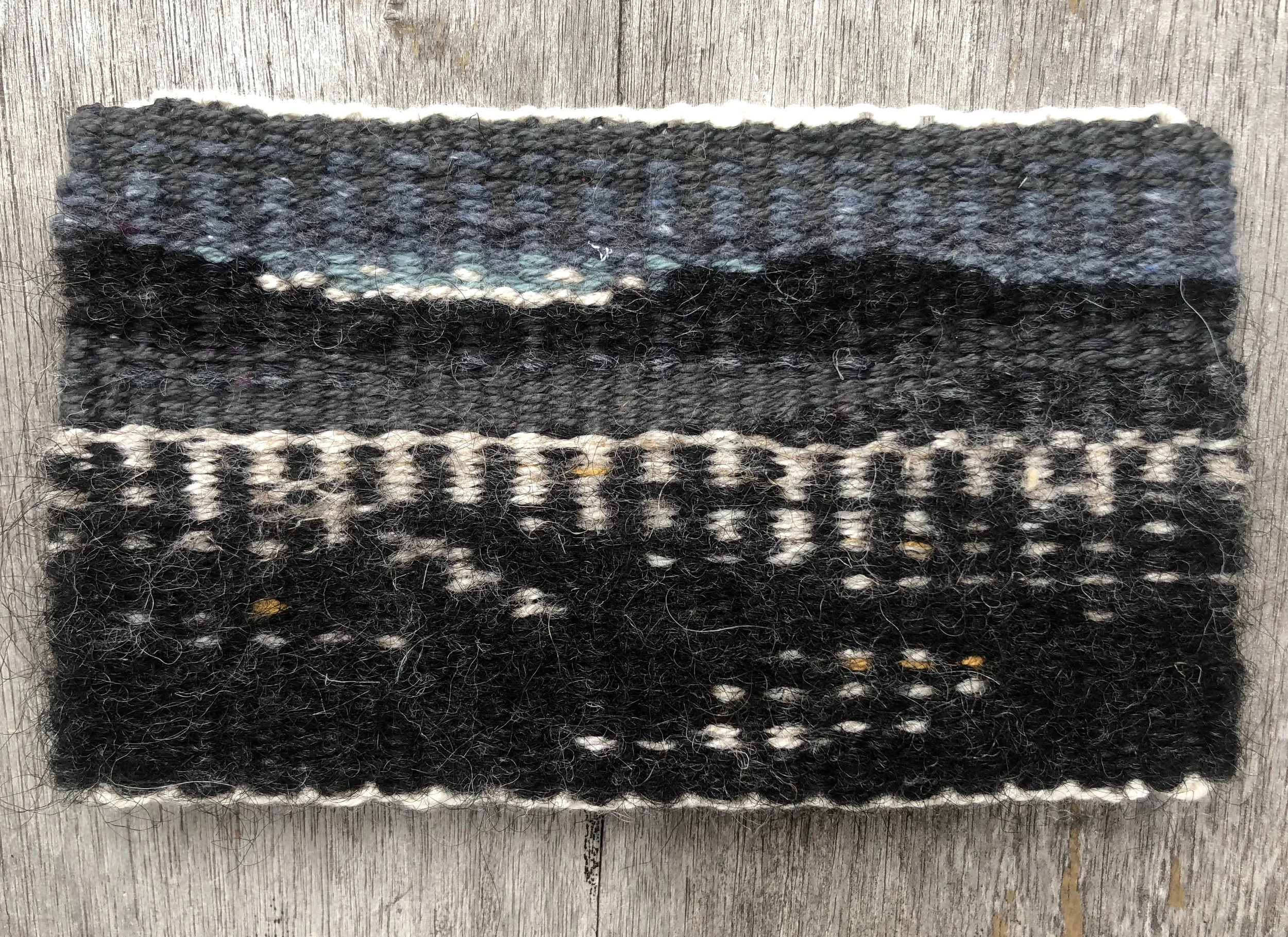 City of Angels, 2018. Linen, wool, and cotton. 3 1/2” x 6”.