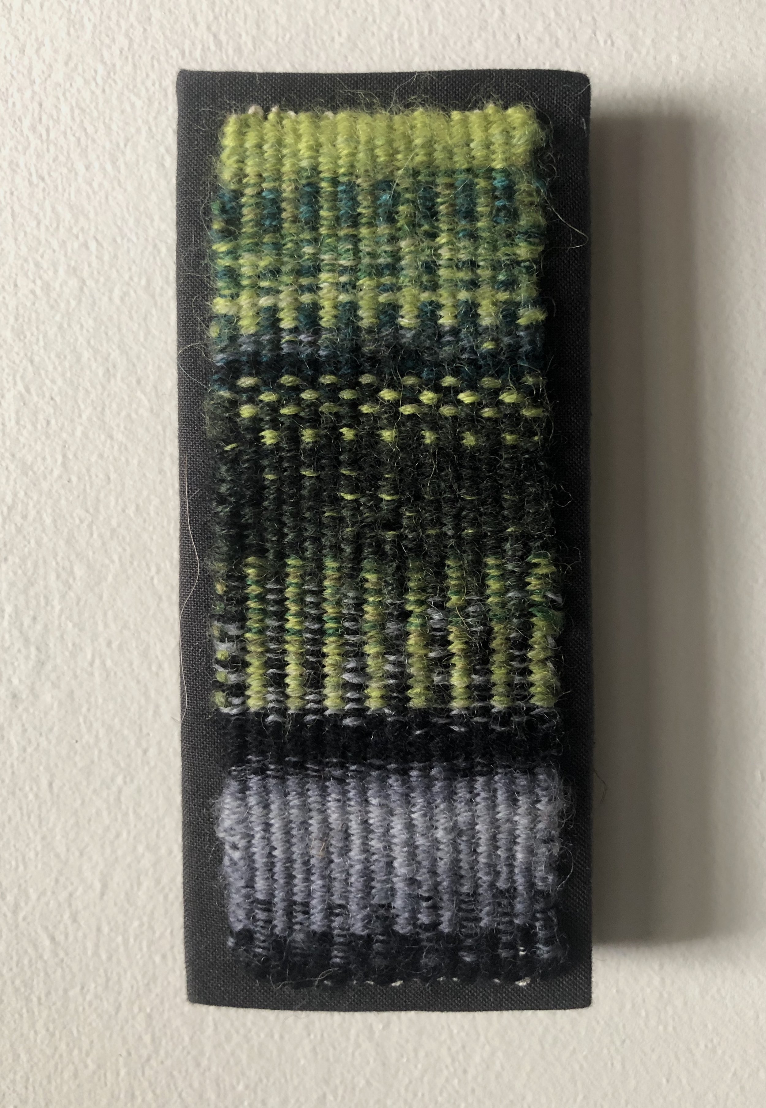   Night Woods , 2019. Cotton warp, wool weft. 2” x 5”. Woven using a four-selvedge tapestry technique. Finalist for the Australian Tapestry Workshop’s 2019 Irene Davies Emerging Artist Award. 