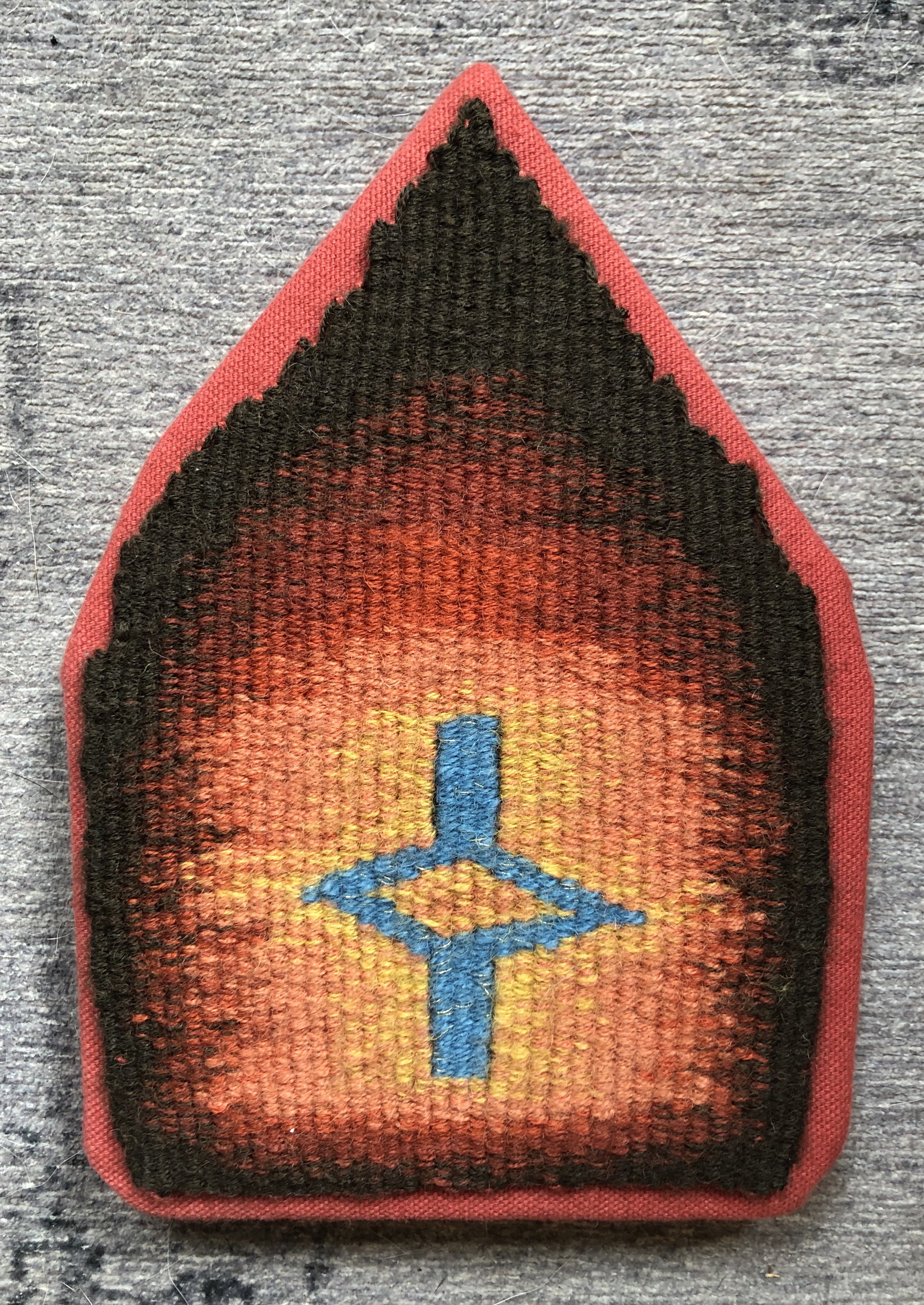   Enclosing a Space , 2019. Linen warp, wool &amp; metal weft. 5" x 7.25". Shaped four-selvedge tapestry. 