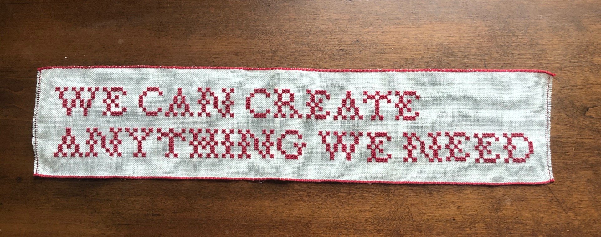   Banner , 2020. Cotton on linen. Stitched with reversible eyelets. 