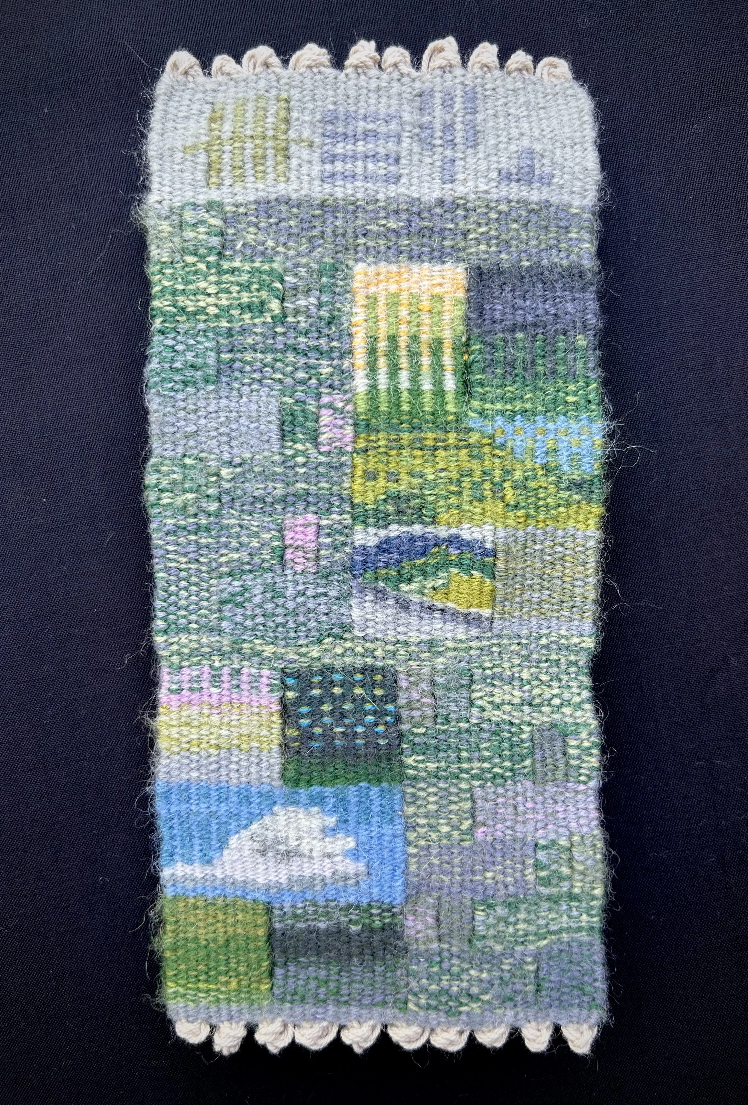   May (Idumea) , 2025. Cotton warp and wool weft. 4” x 8.5”. 