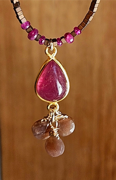 Screenshot 2026-01-24 at 13-12-44 Ruby Chocolate Moonstone Copper Hematite Necklace NWH4625G - Faire.png