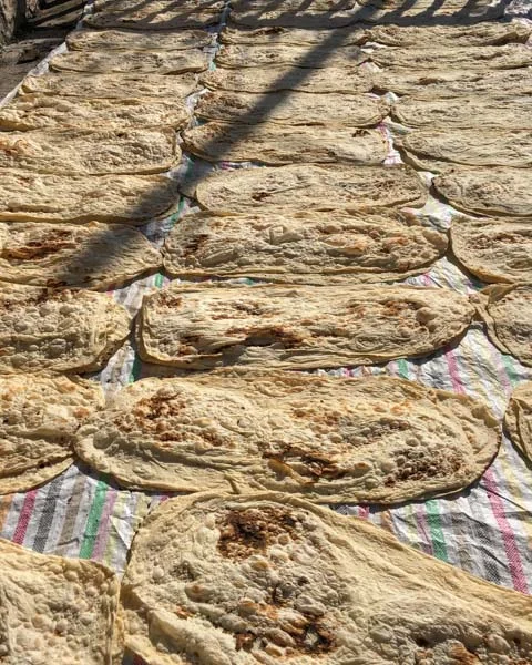 You know how Game of Thrones make such a fuss about how winter is coming? In Armenia, the fuss is real. At one home we visited near Argel, a bunch of ladies bake lavash for home use. They bake enough to last them through winter. Here it's drying on the roof. Once dry, they'll stack it and put it in a spare bedroom. (It's easy to rehydrate dried lavash by sprinkling it with water and covering it for a few minutes.) Across the hall, from the lavash bedroom, one of the kids had painted "The Boy Who Lived" over the door frame. Harry Potter fans are everywhere.