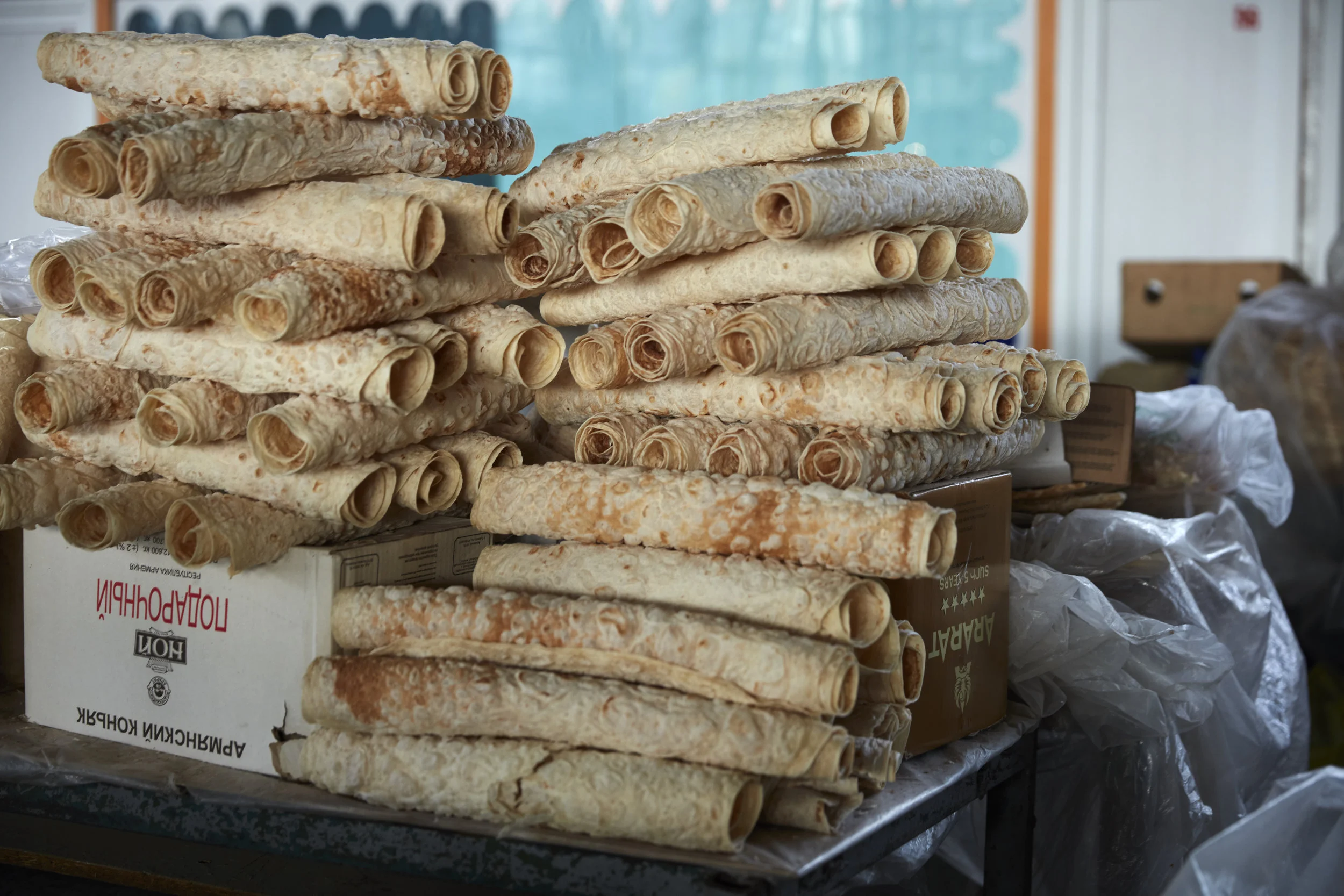 In the fall and winter, GUM market also sells lavash that has been rolled and dried to crumble into bowls of khash , a rich bone broth.