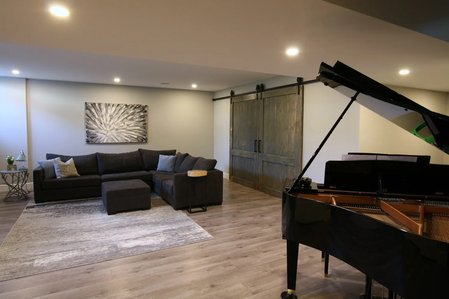 Finished Basement Family Room with Custom Barn Door