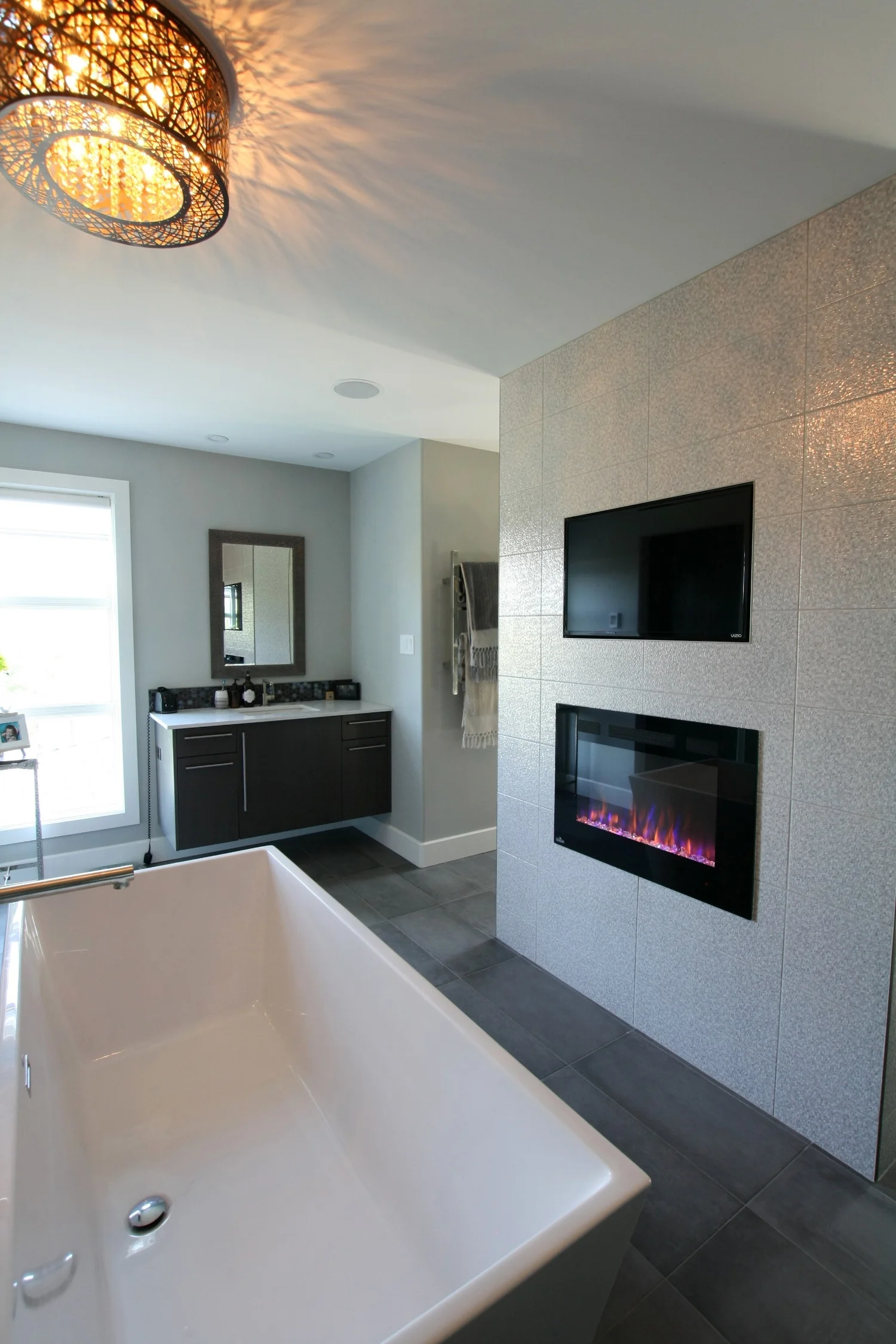 Ensuite Bathroom with custom built-in TV & fireplace