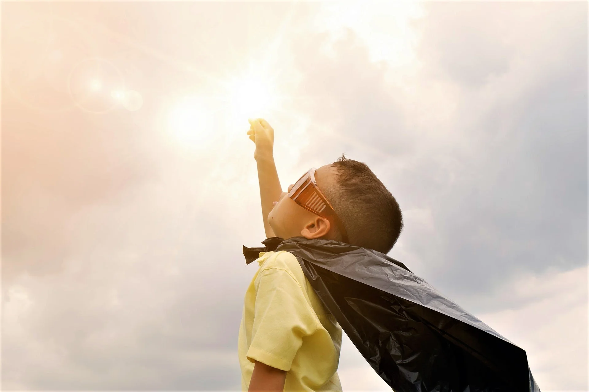 Boy with Superhero cape Pexels.jpeg