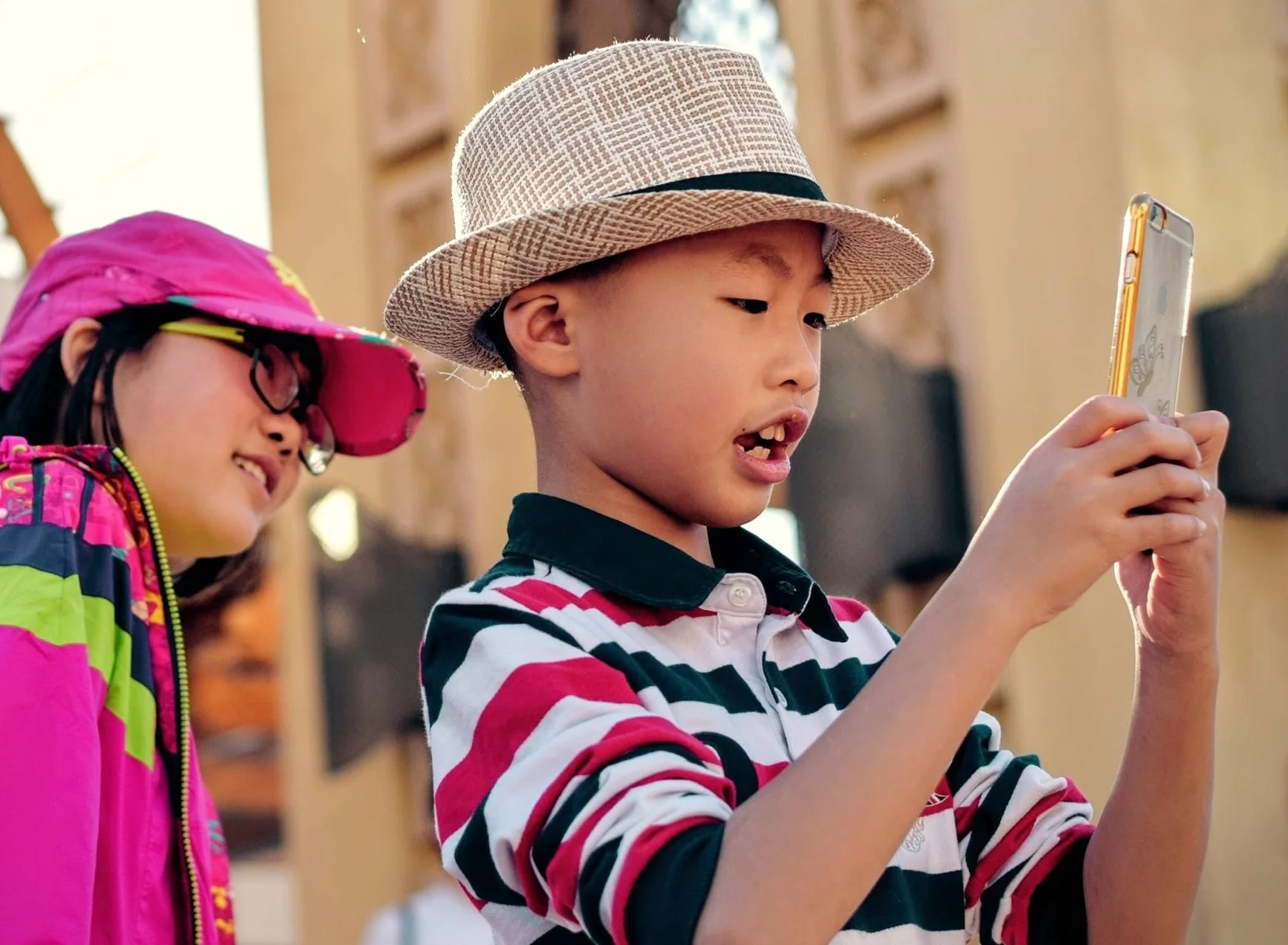 Asian boy with phone Pexels.jpg