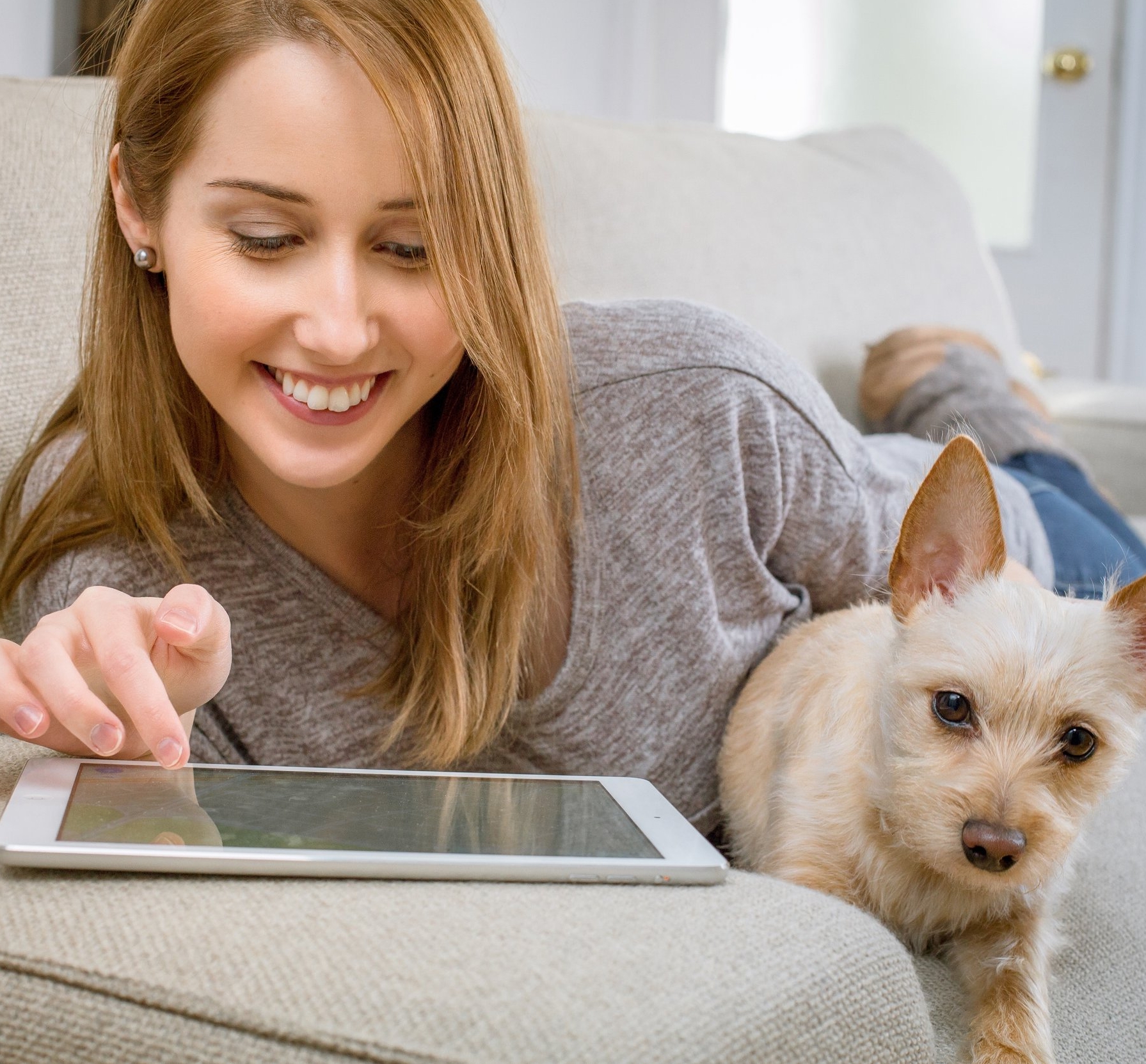 Girl with ipad and dog.jpg
