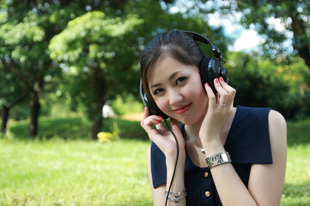 pexels girl with headphones.jpeg