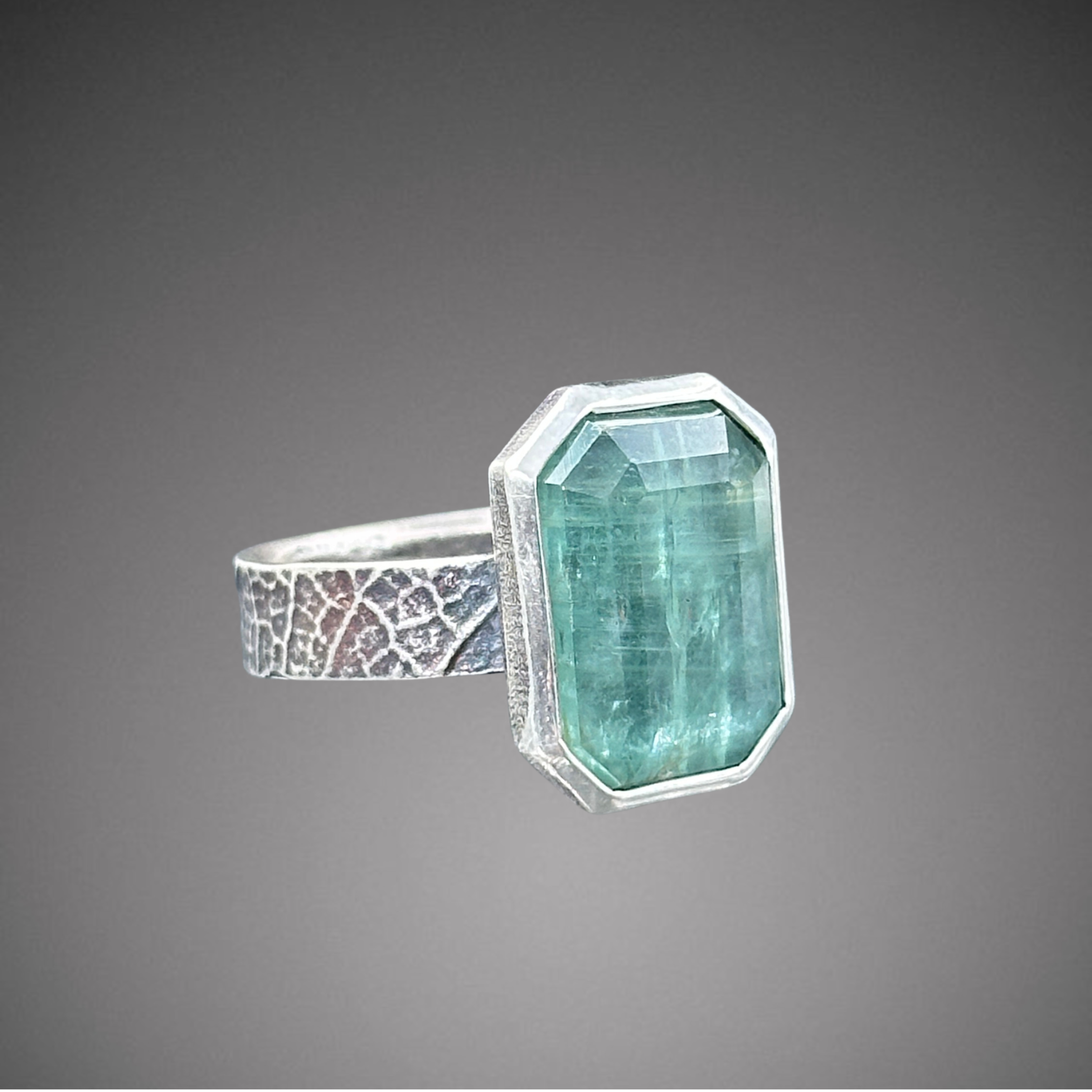 Emerald cut Kyanite on Leaf texture band size 8