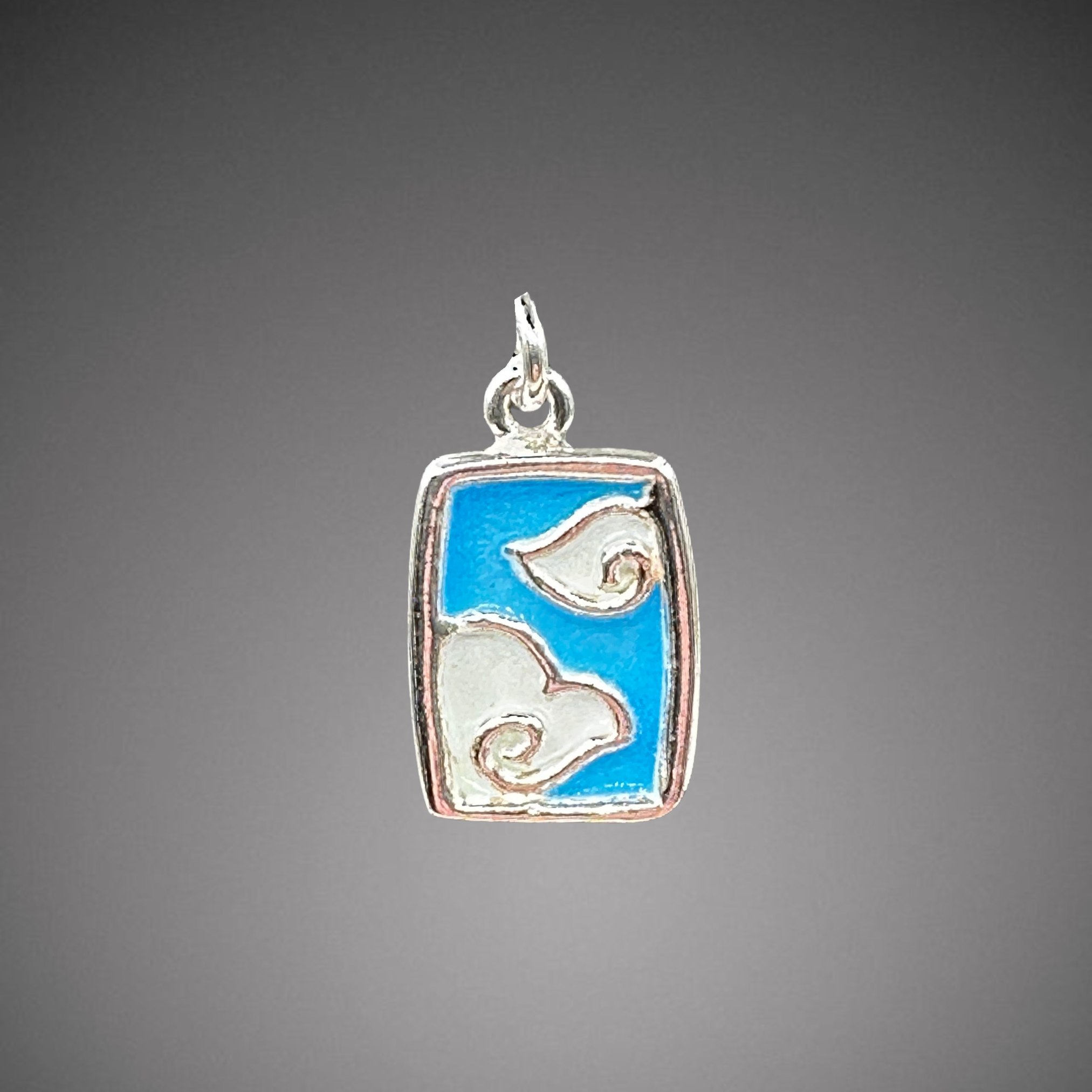 Clouds on blue sky Charm