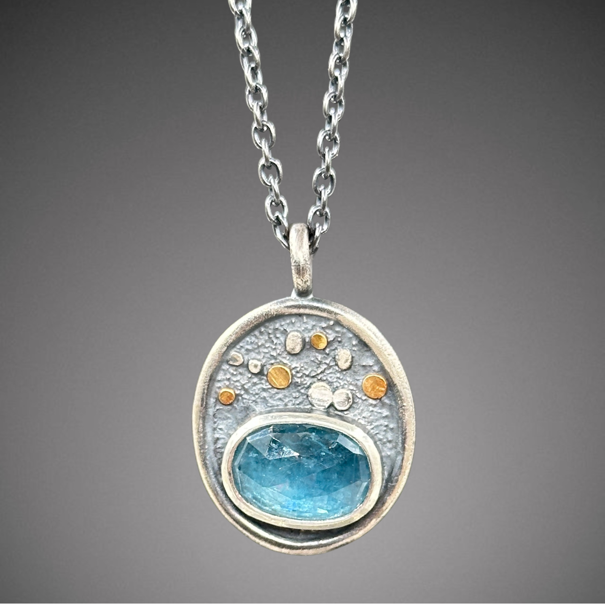 blue kyanite pebble pendant.png