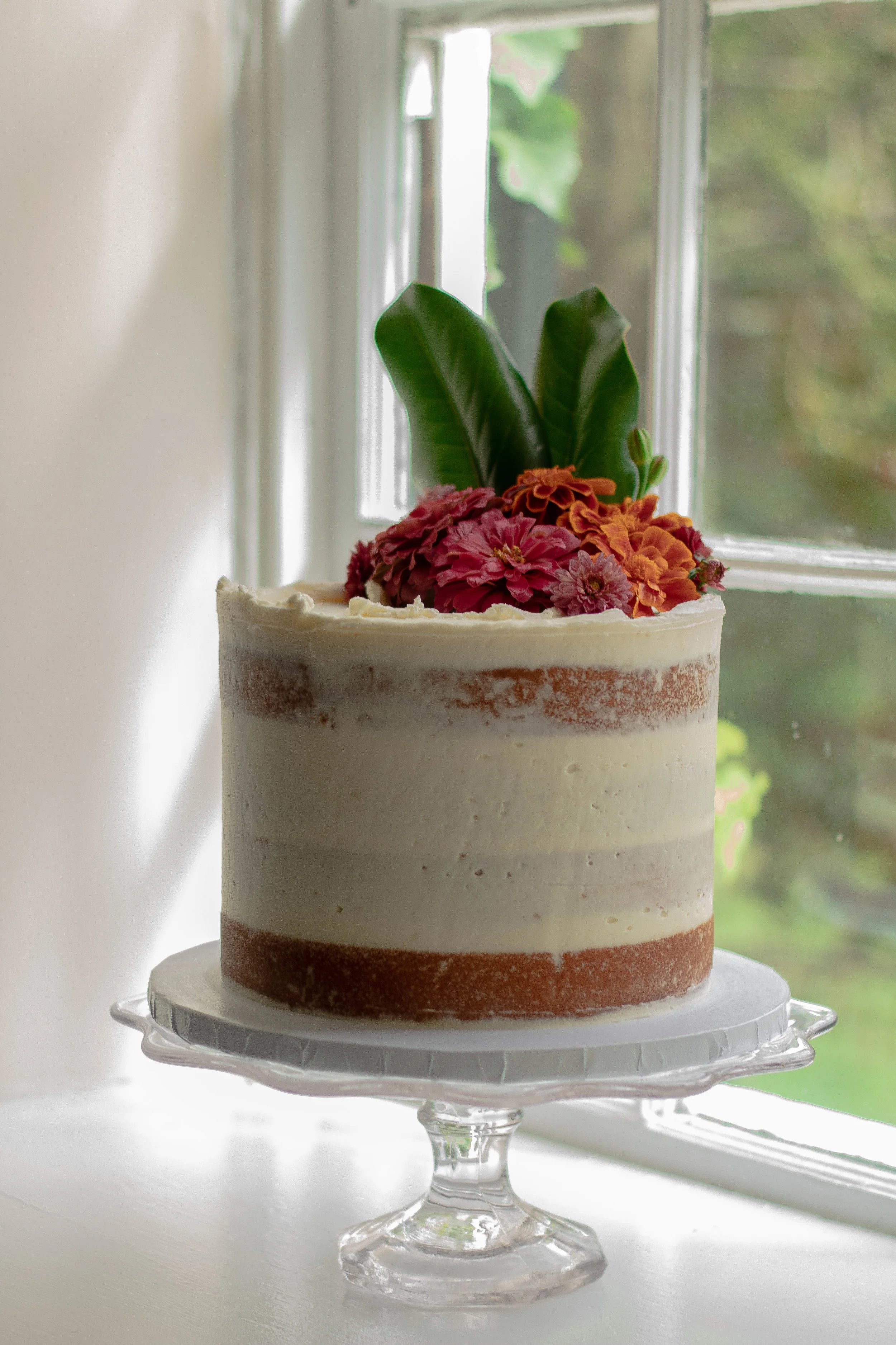 Scout’s Bake Shop created this masterpiece and Ballenger windows are made for cakes!