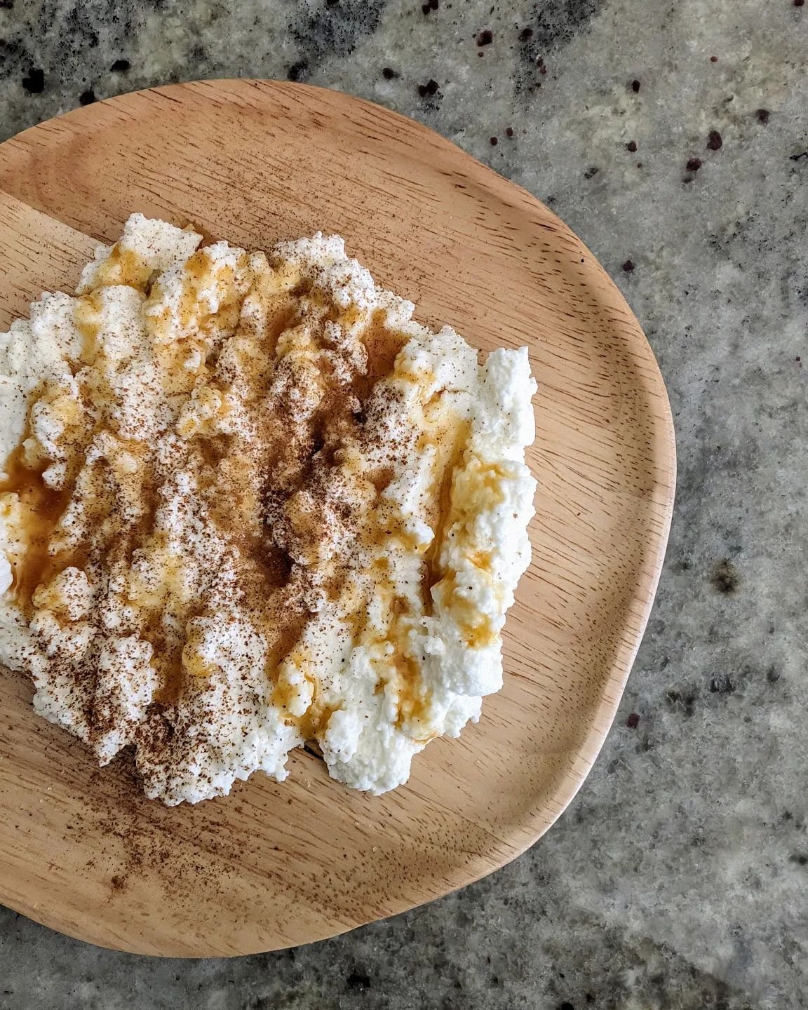 Breakfast, Sicilian style! Home made ricotta, raw local honey, and a touch of cinnamon.