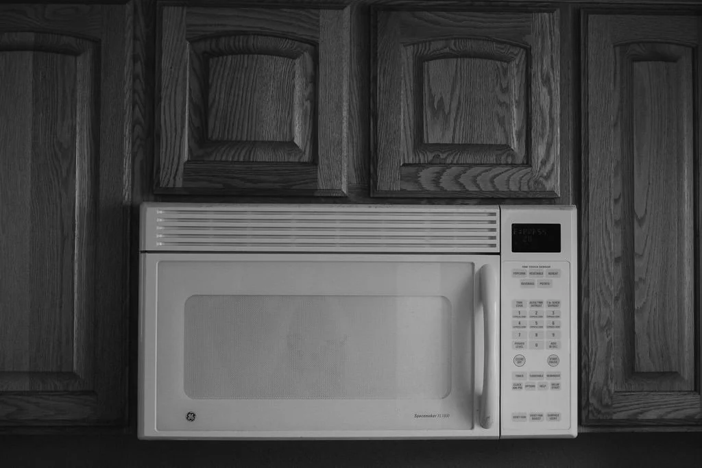 Microwave water in a glass container for minimal coffee recipe