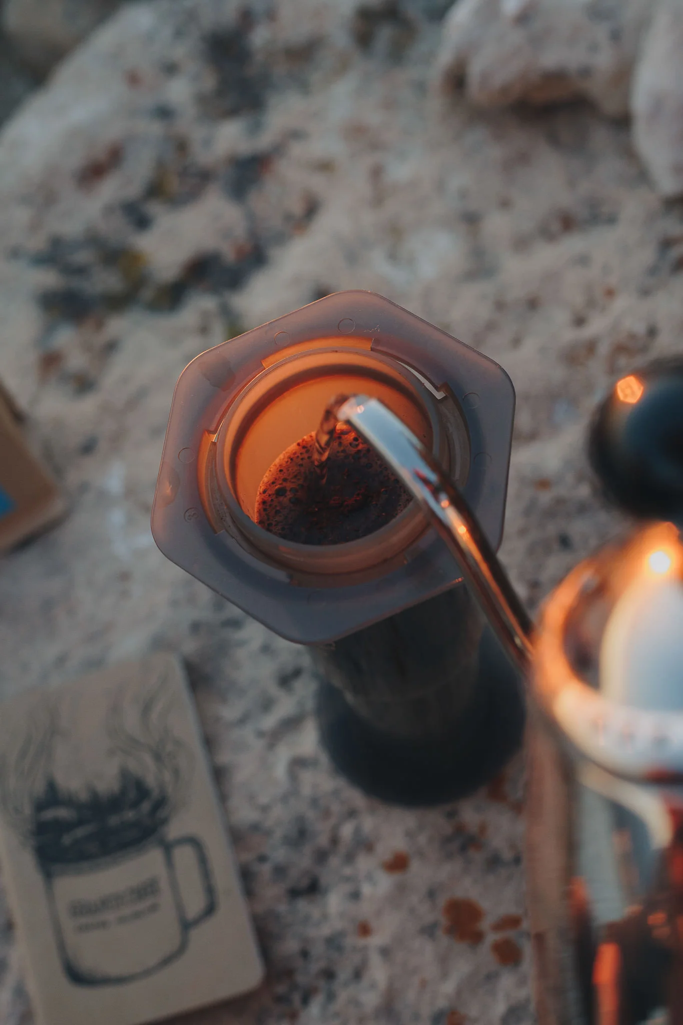 Pouring water into an Aeropress