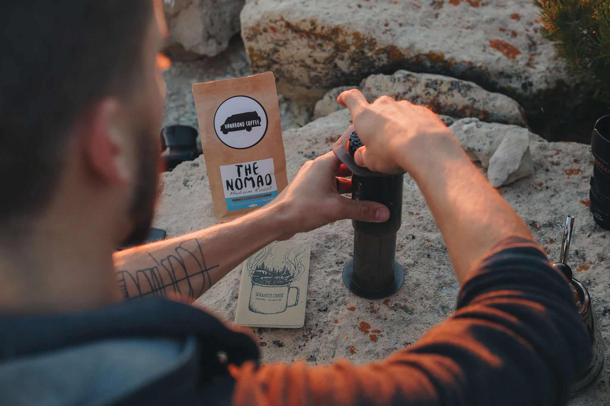 Steeping coffee in an Aeropress while adventuring outdoors