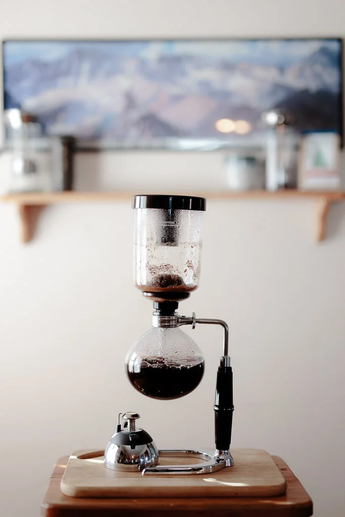 Allow the coffee to draw into the lower vessel