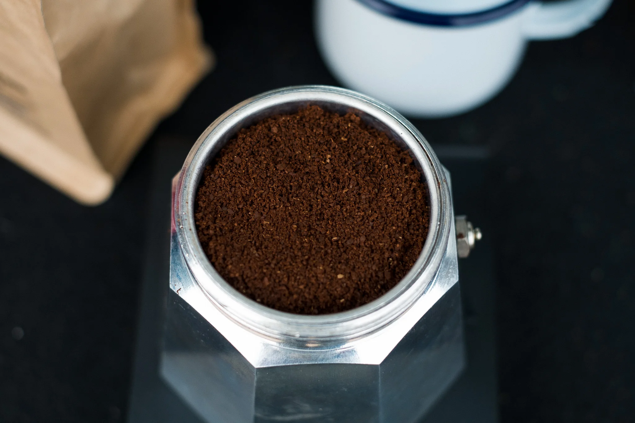 Use a fine espresso like grind for Moka Pot coffee brewing