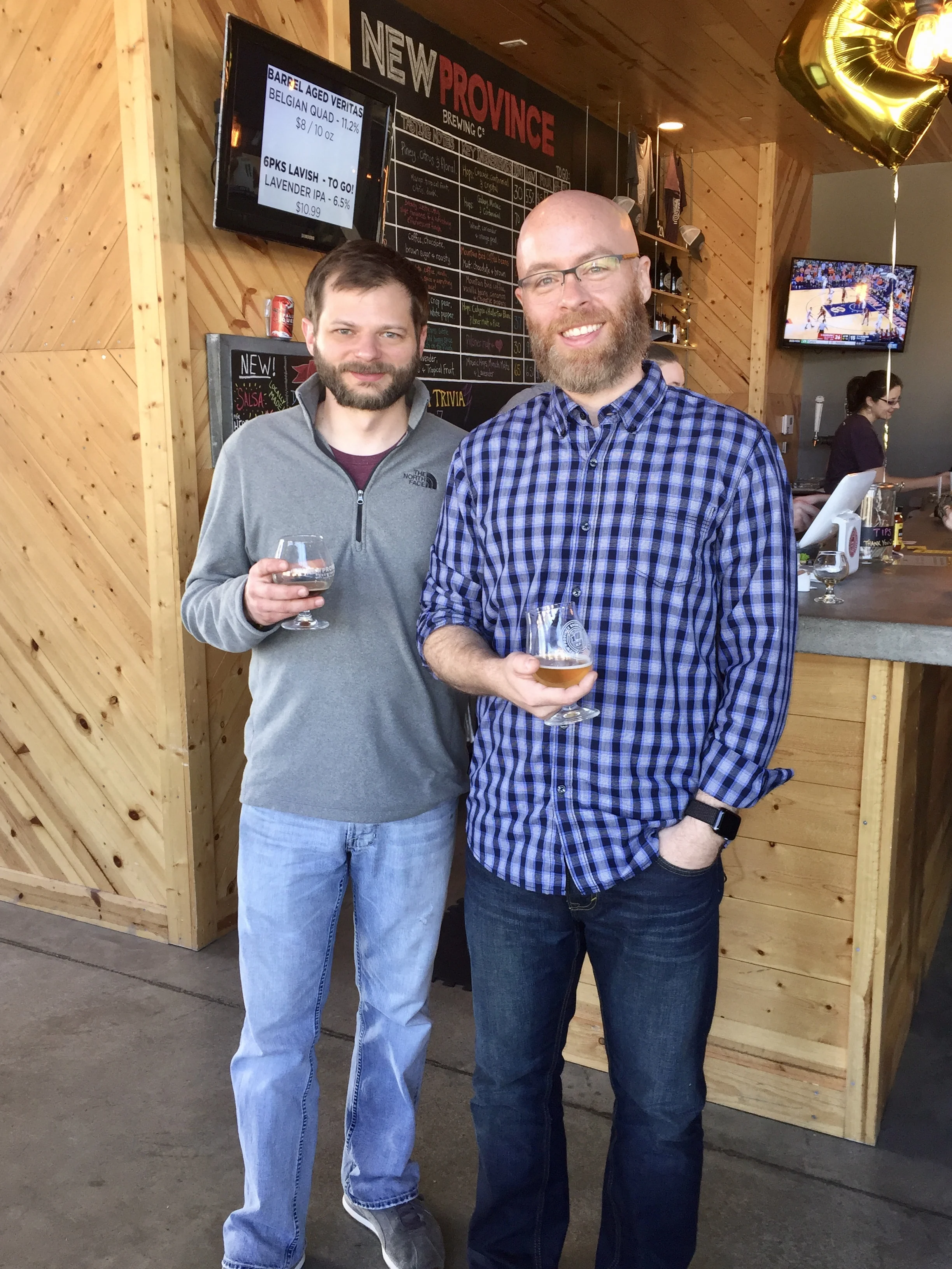 That's New Province head brewer Kort Castleberry on the left and me on the right. I call this picture, "Battle of the Beards." I have since shaved, Kort has not. Has anyone ever seen him without a beard? What's he hiding under there? 