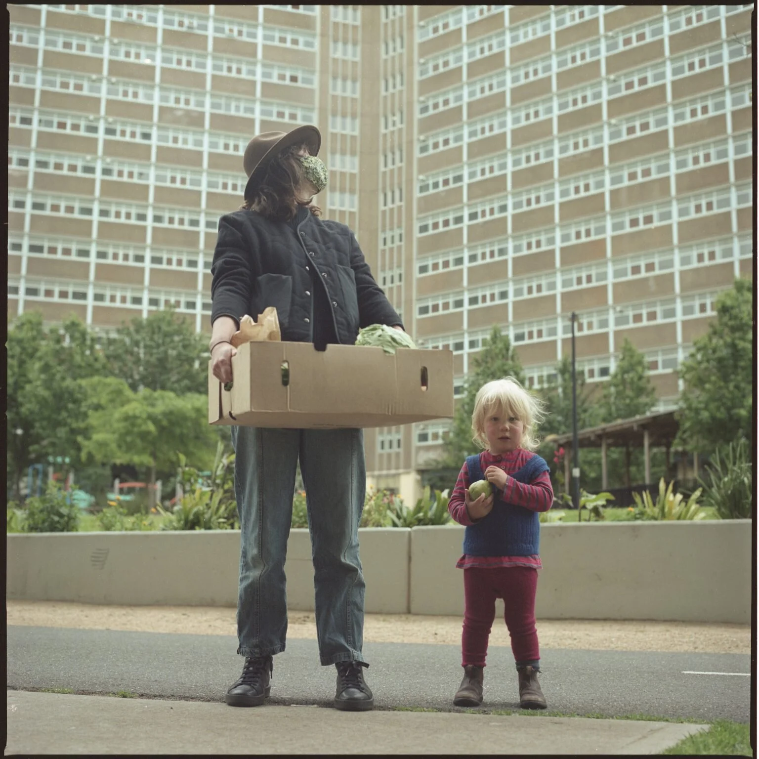 Photo by Assemble Papers of a customer and child at our Carlton market