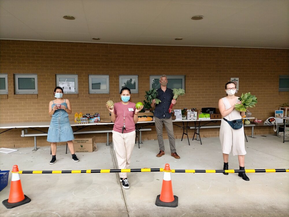 The Community Grocer team: Isabella, Nadhirah, Russ, and Tess at the relaunch of our Pakenham Market