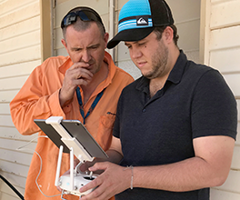 Showing-locals-drone-technology.png
