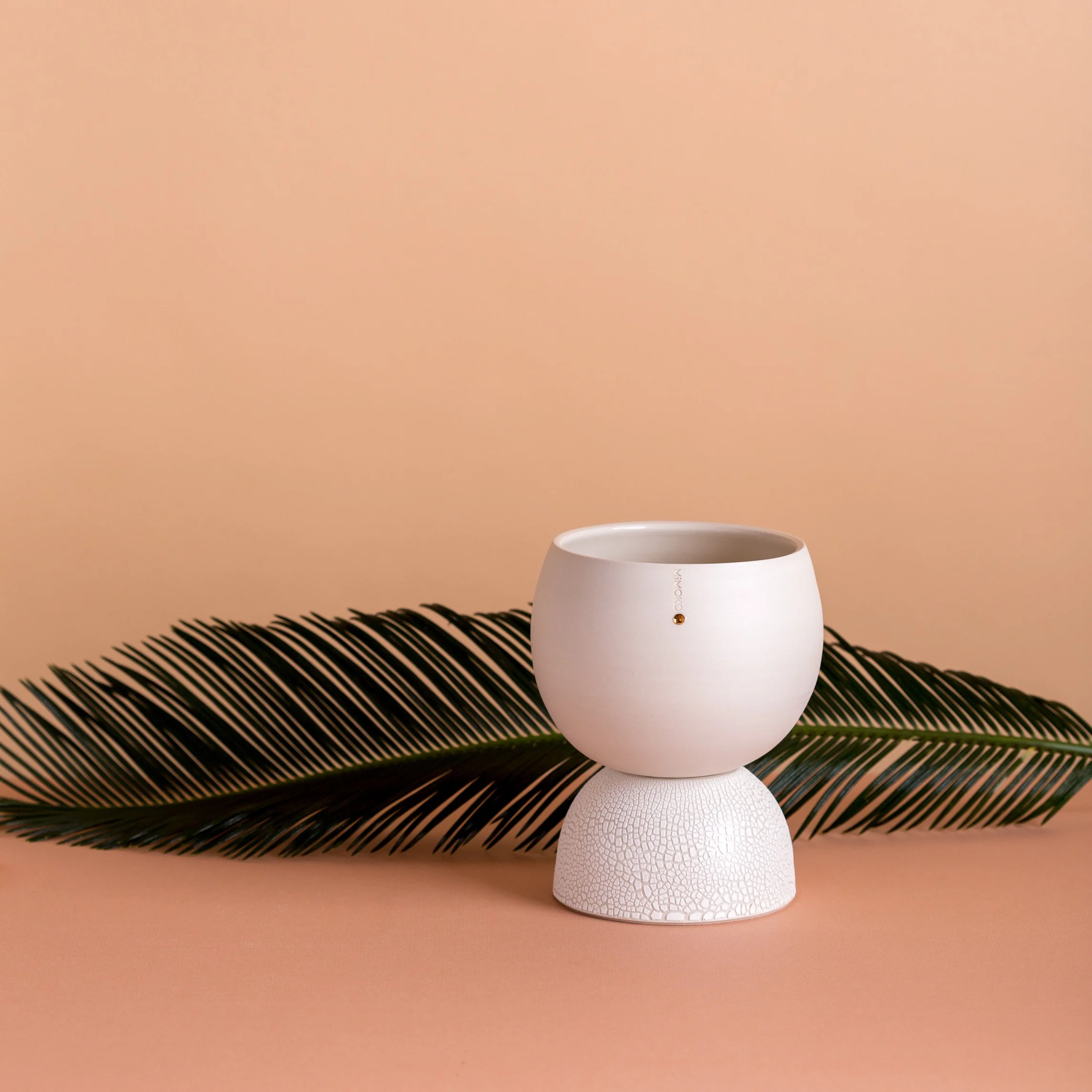 MiMOKO Ceramics | Ellipse self watering planter with tropical leaf