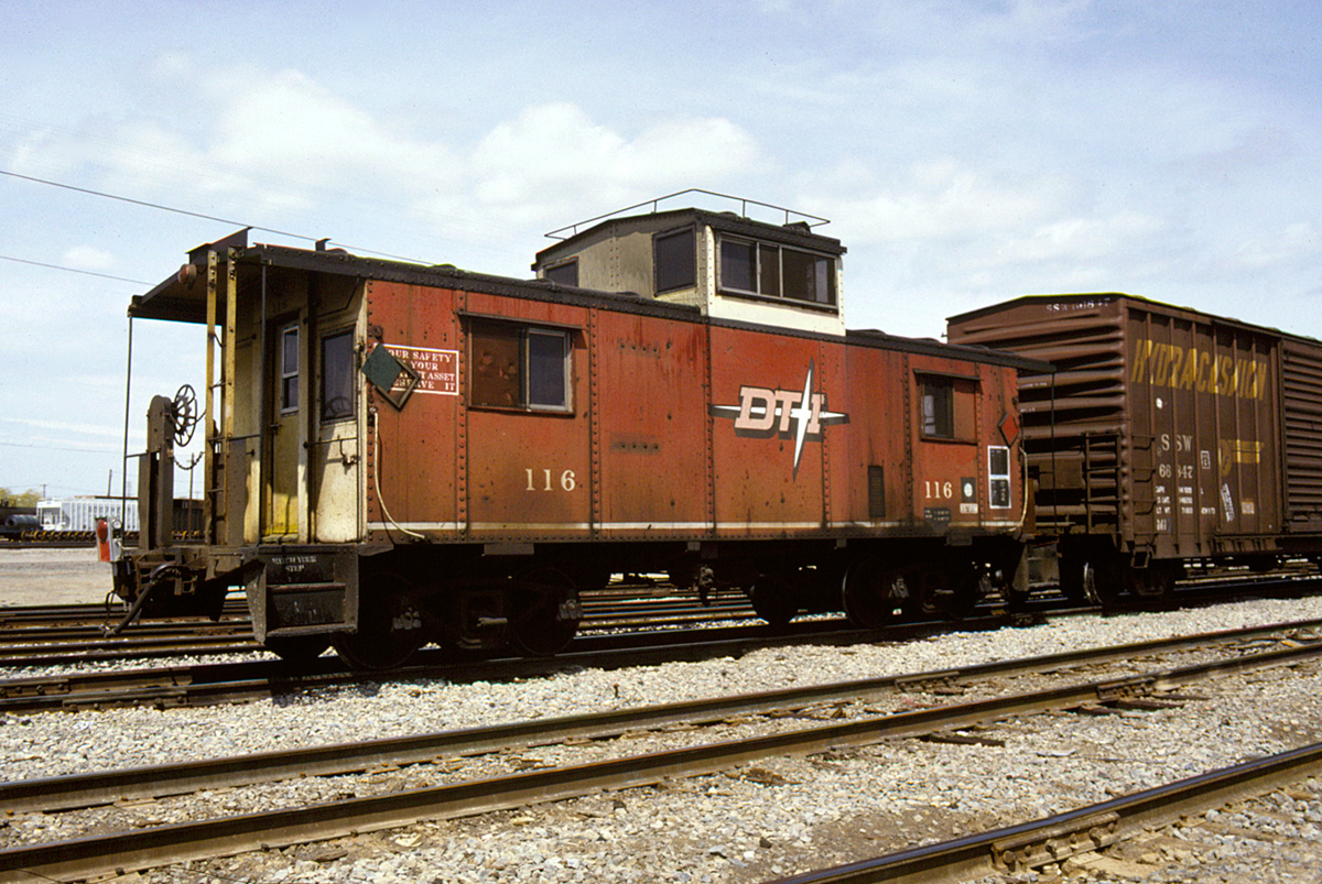 DT&I 116 in regular service on a freight train