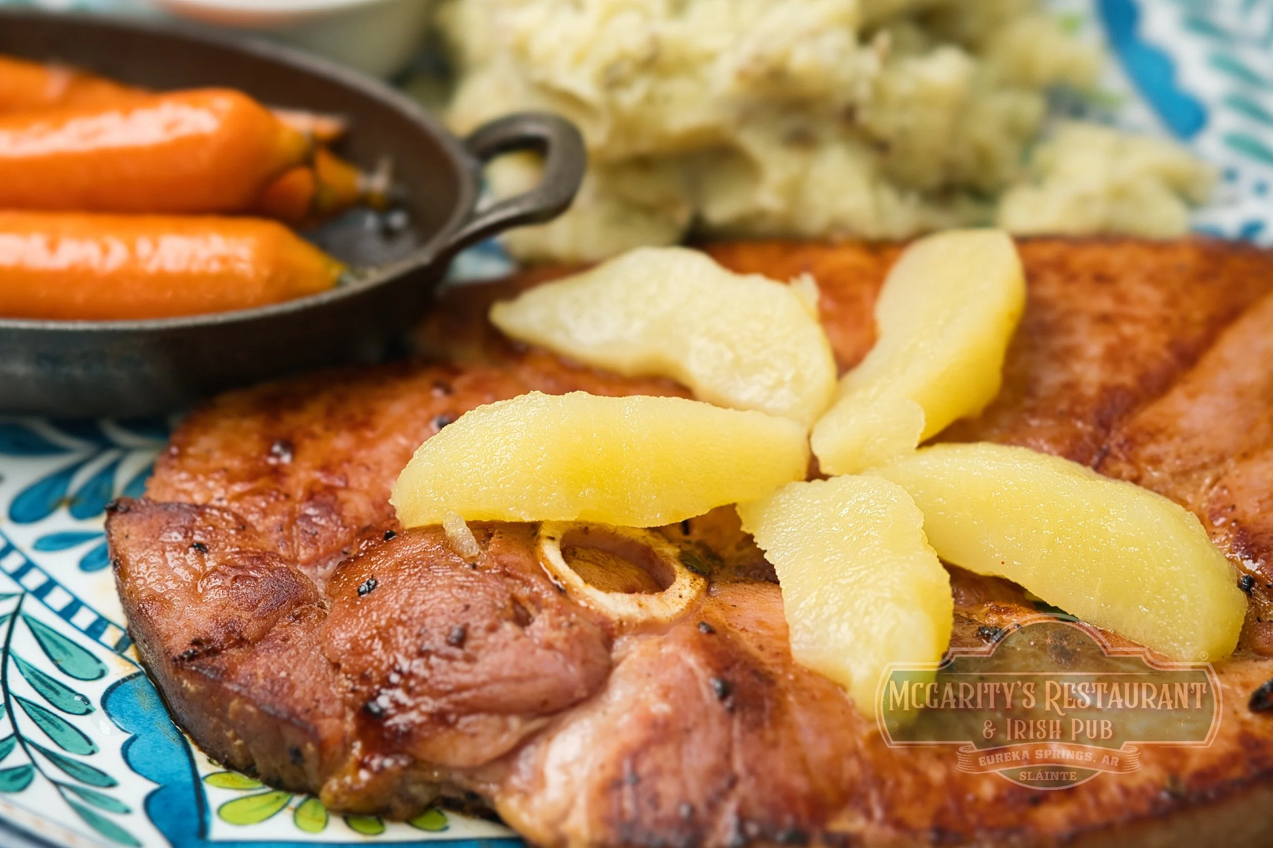 Irish Gammon Ham Steak with mashed potatoes, braised carrots, and soft apple slices at McGarity’s in Eureka Springs.