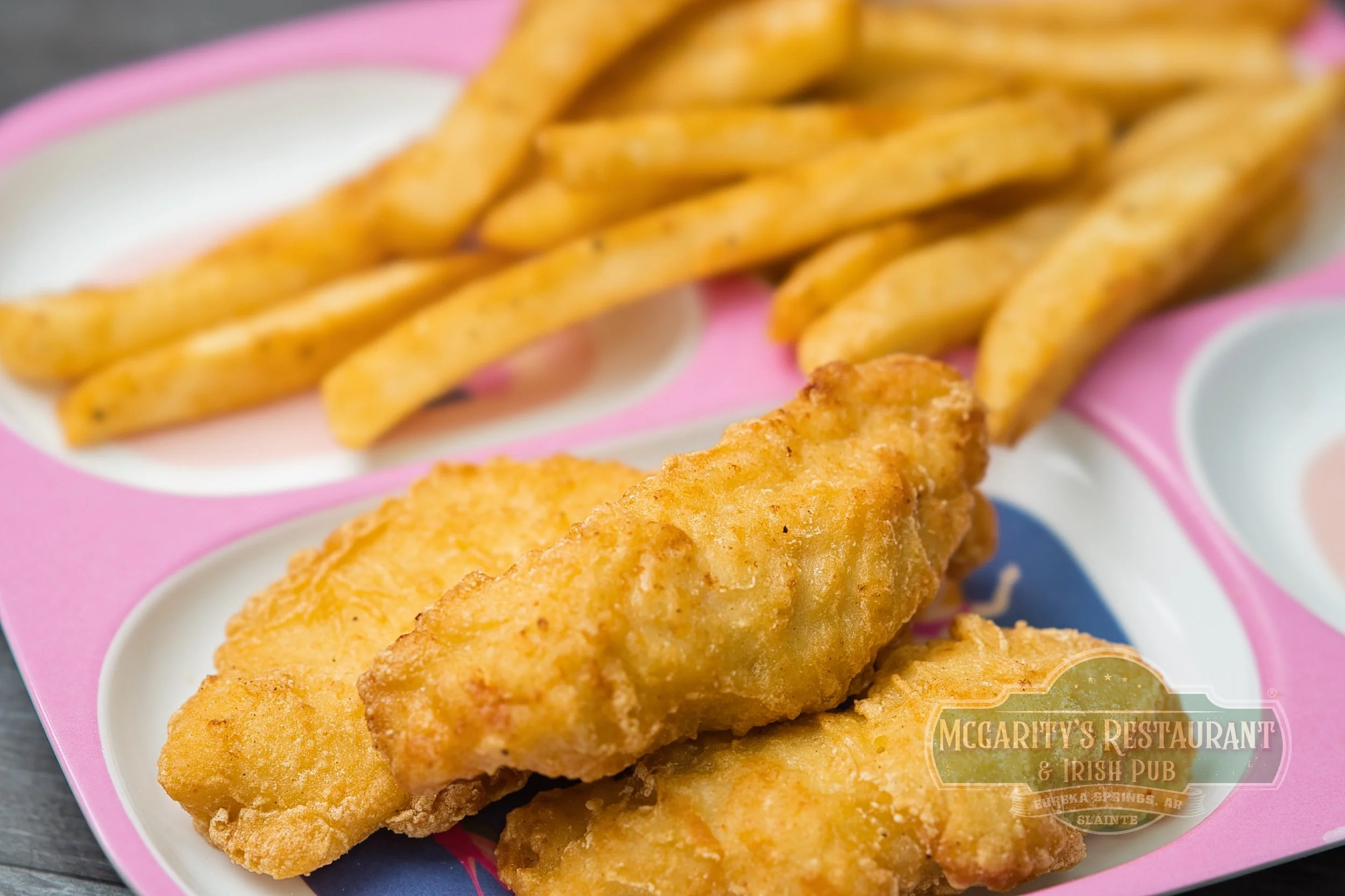 Kids' Chicken Strips with seasoned French fries at McGarity’s in Eureka Springs.