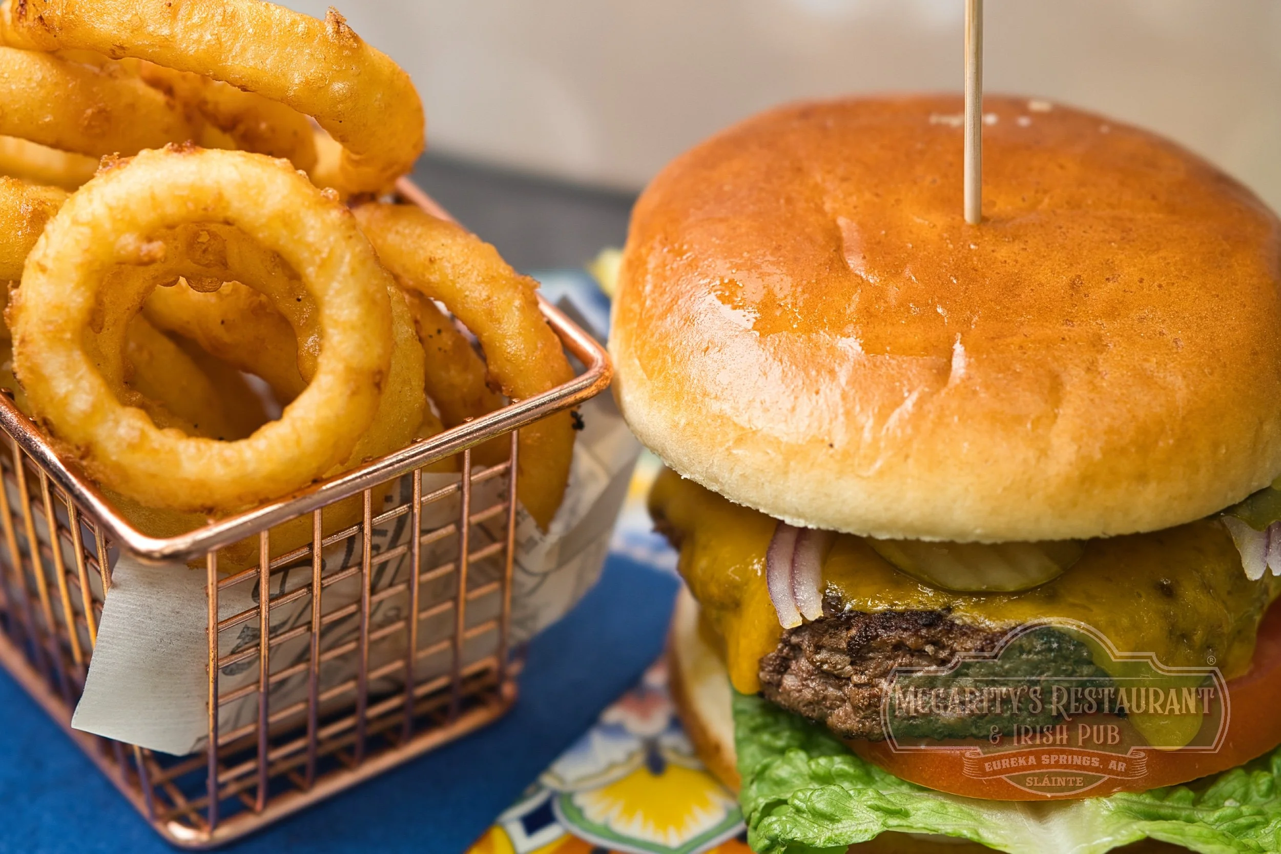 Steakhouse Burger with cheddar and onion rings at McGarity’s in Eureka Springs.