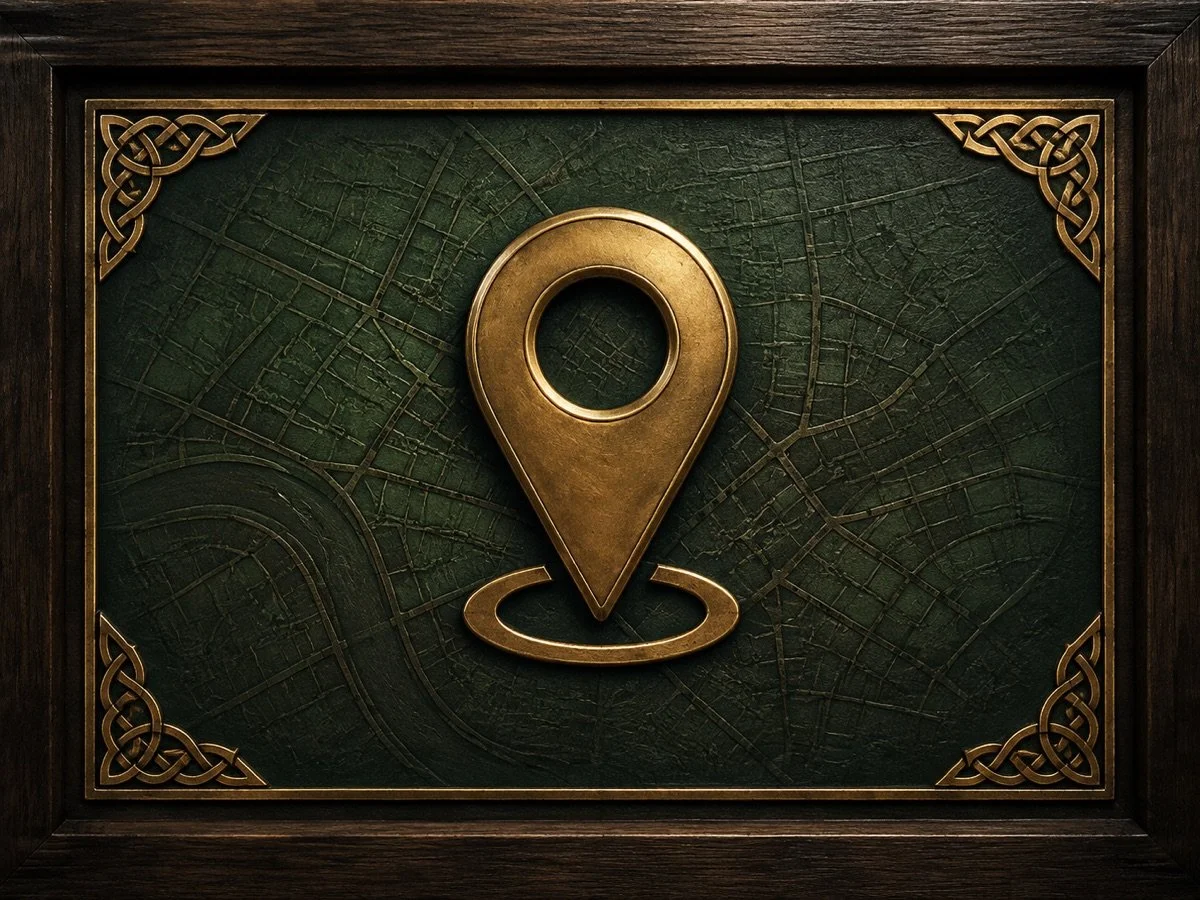 Antique brass location pin on an emerald green Celtic map for McGarity’s Restaurant & Irish Pub at 2070 E Van Buren in Eureka Springs, Arkansas.