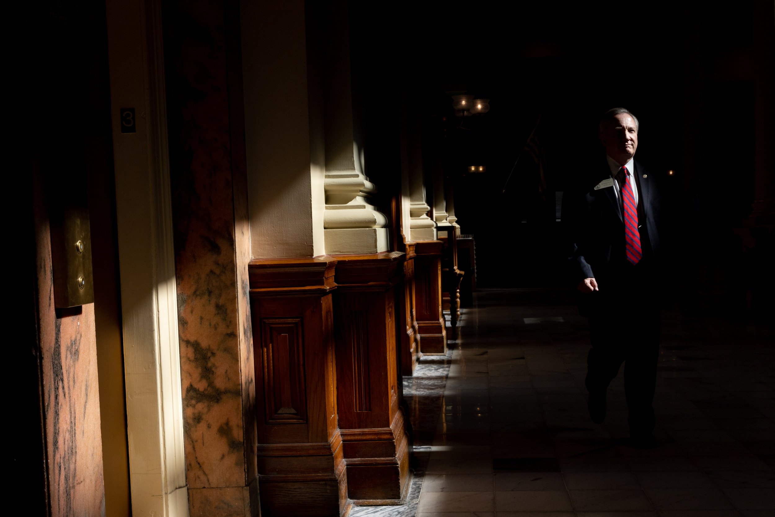  Georgia State Rep. Doug Stoner, D-Smyrna, walks down a hallway of the Capitol in Atlanta on Wednesday, March 15, 2023. 