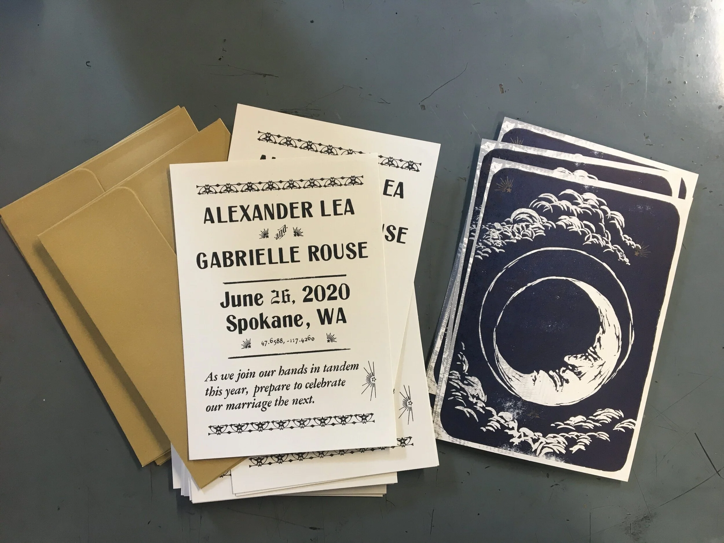 Two-sided wedding announcements with gold envelopes