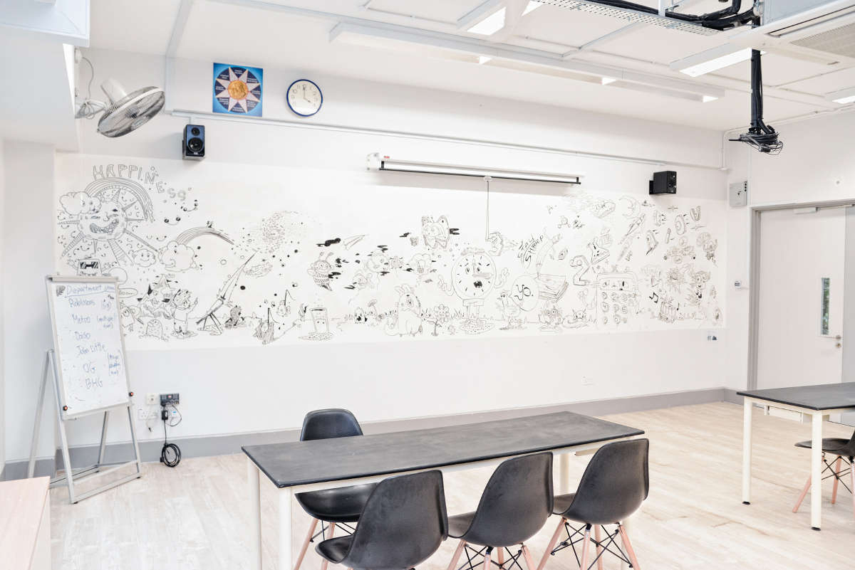 Assumption English School - Dry Erase IdeaPaint walls breaks the boundaries of traditional whiteboard panels.